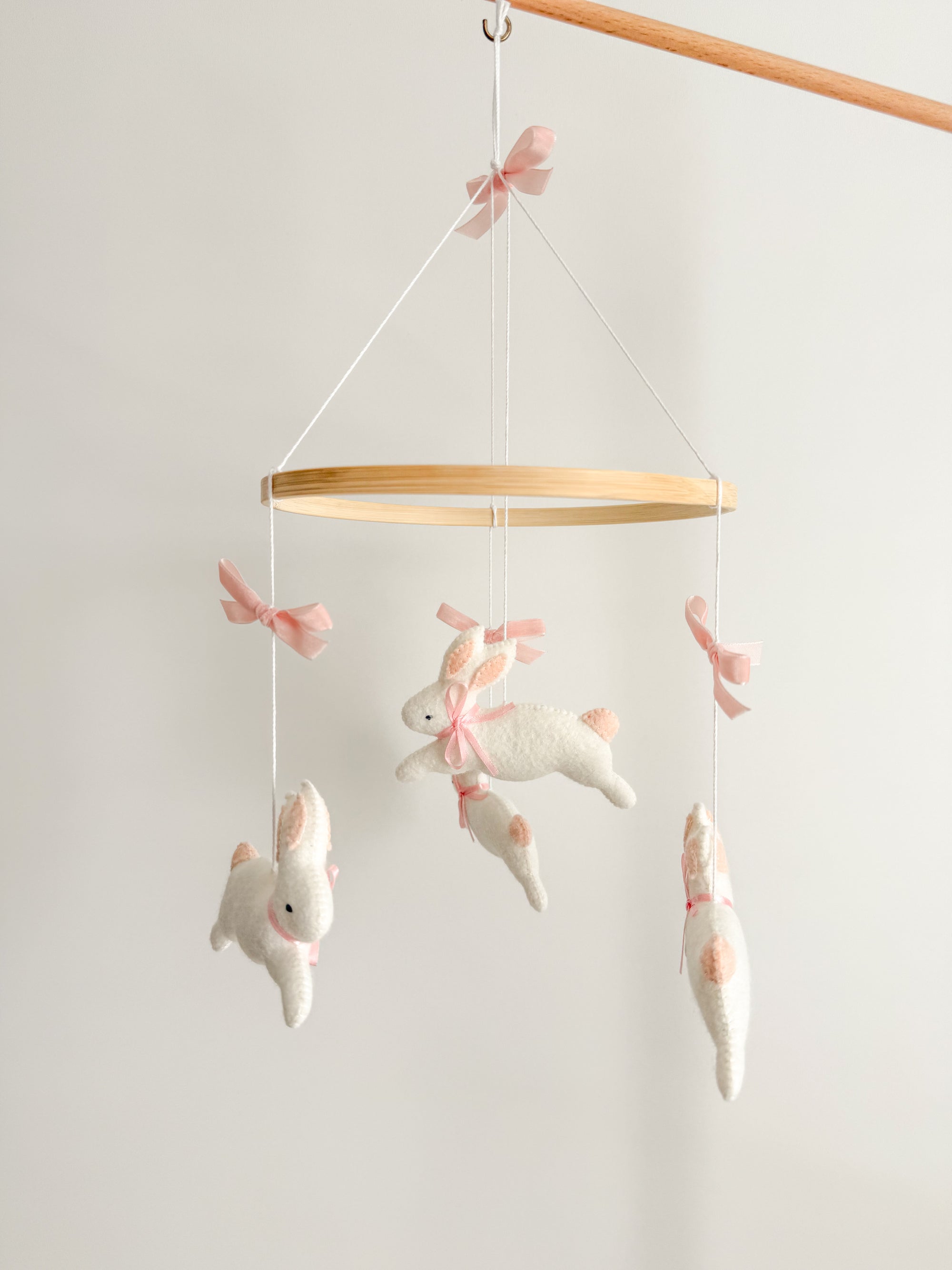 Bunny mobile with pink bows
