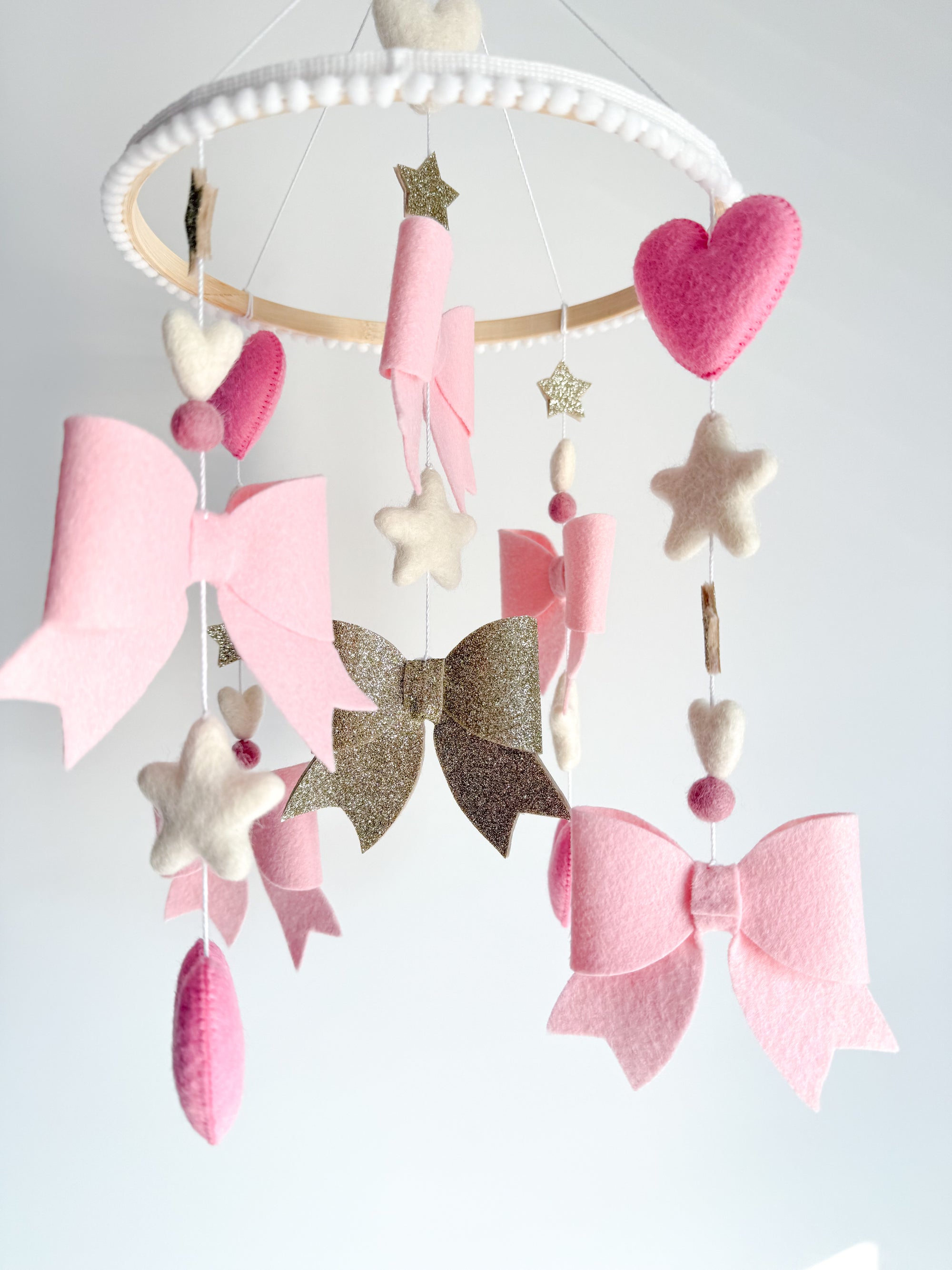 Bow mobile with glitter details