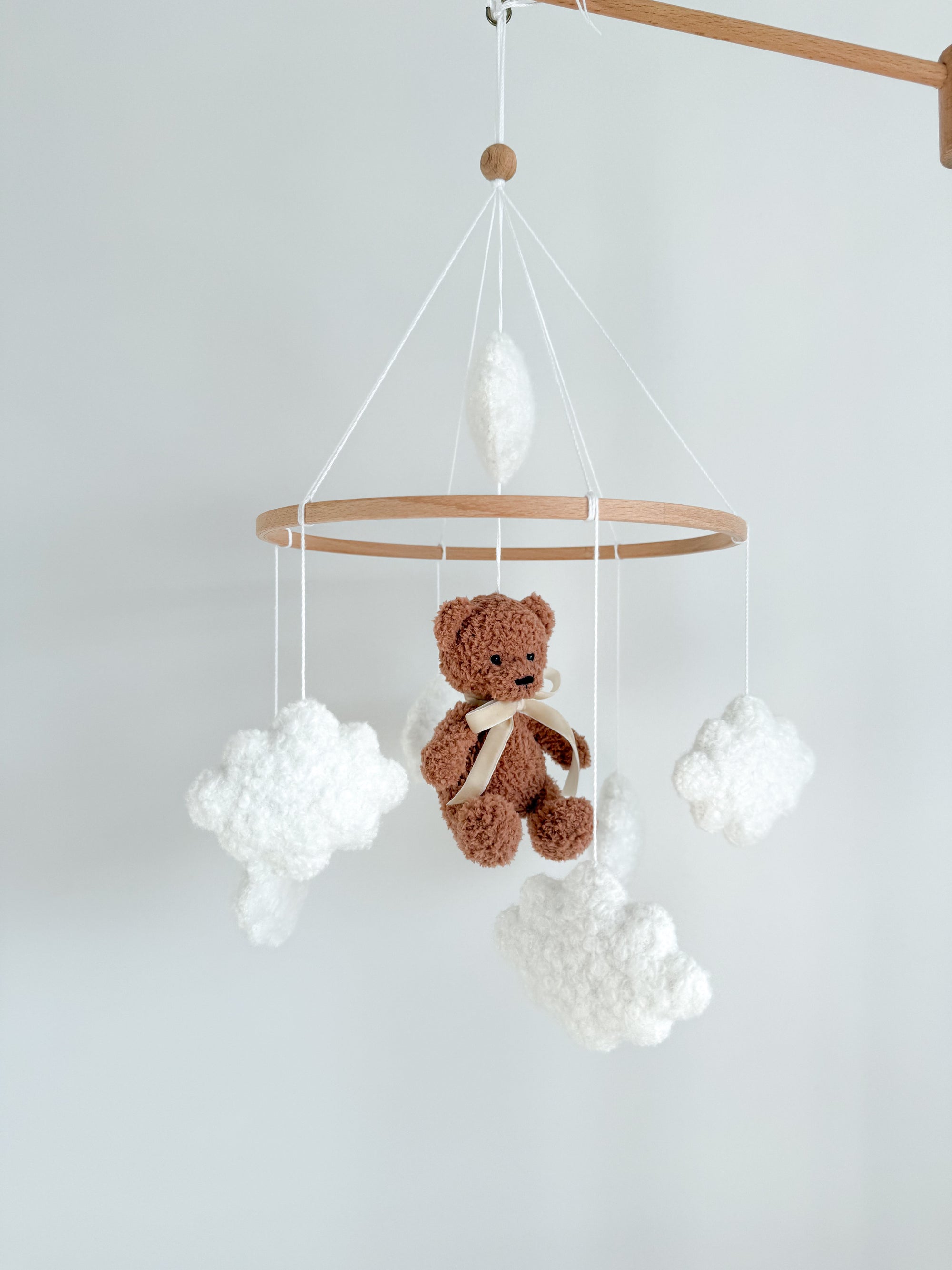 Boucle mobile with brown teddy bear