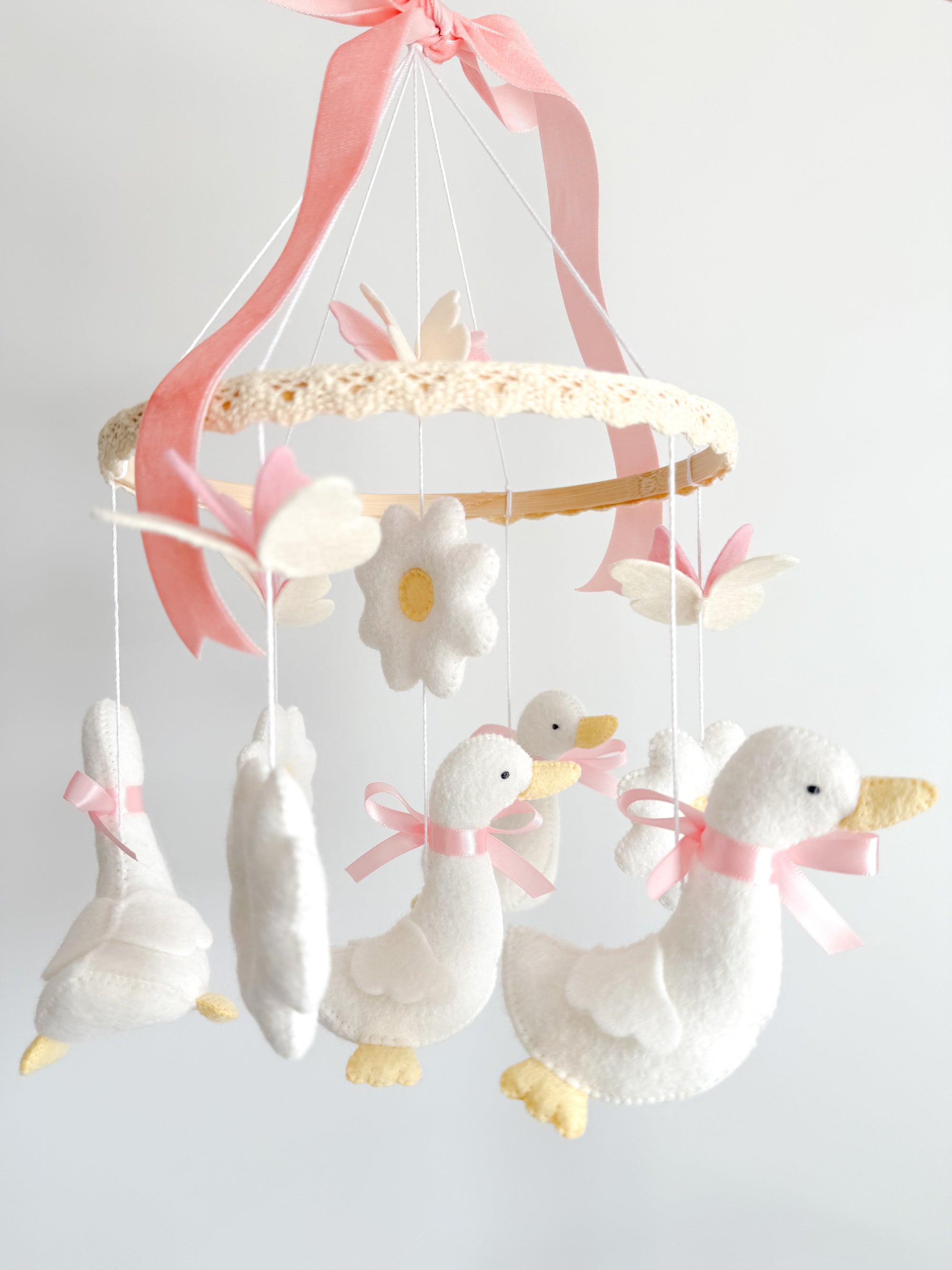 Pink mobile with goose