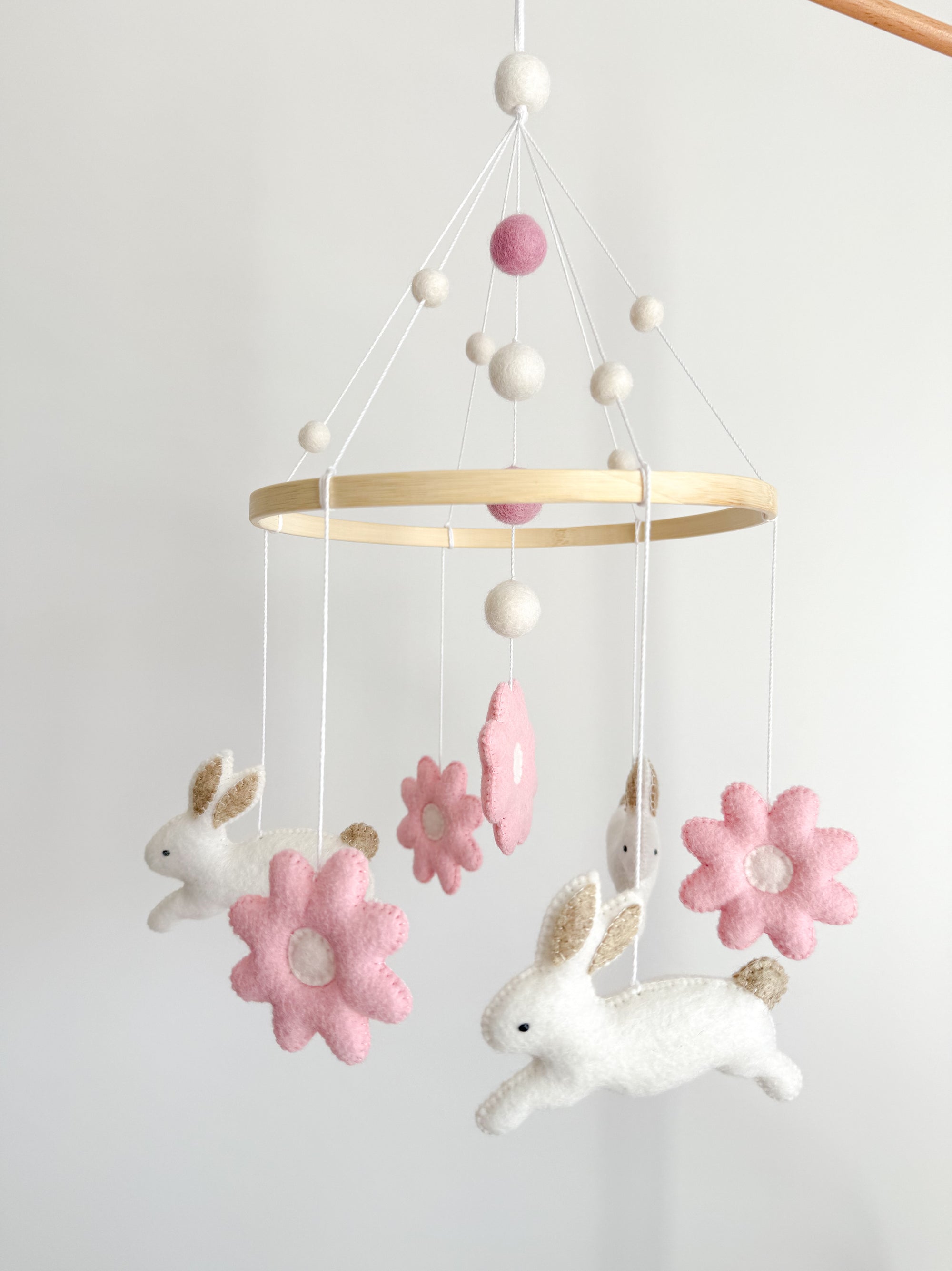 Bunny mobile with pink flowers
