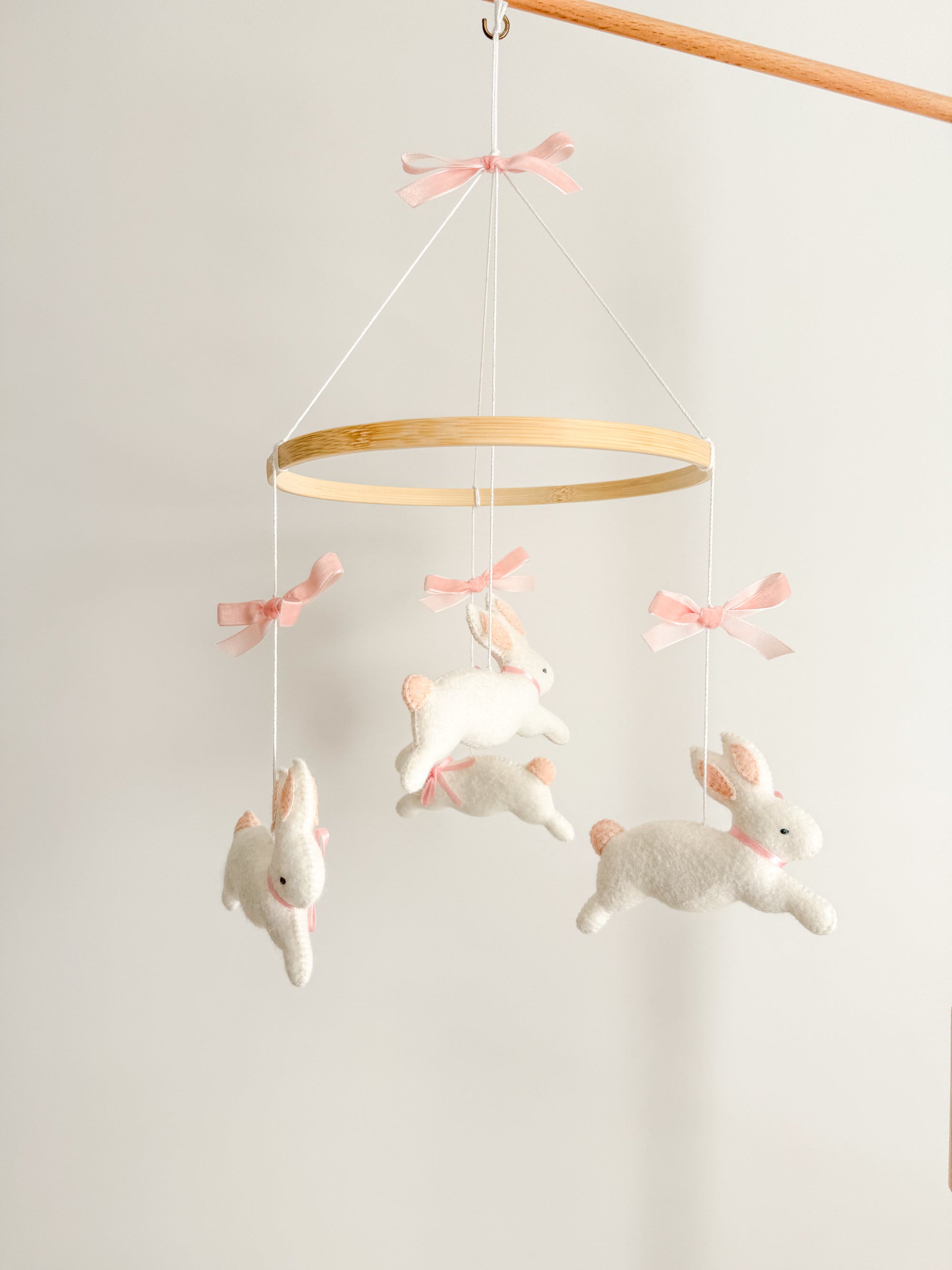 Bunny mobile with pink bows