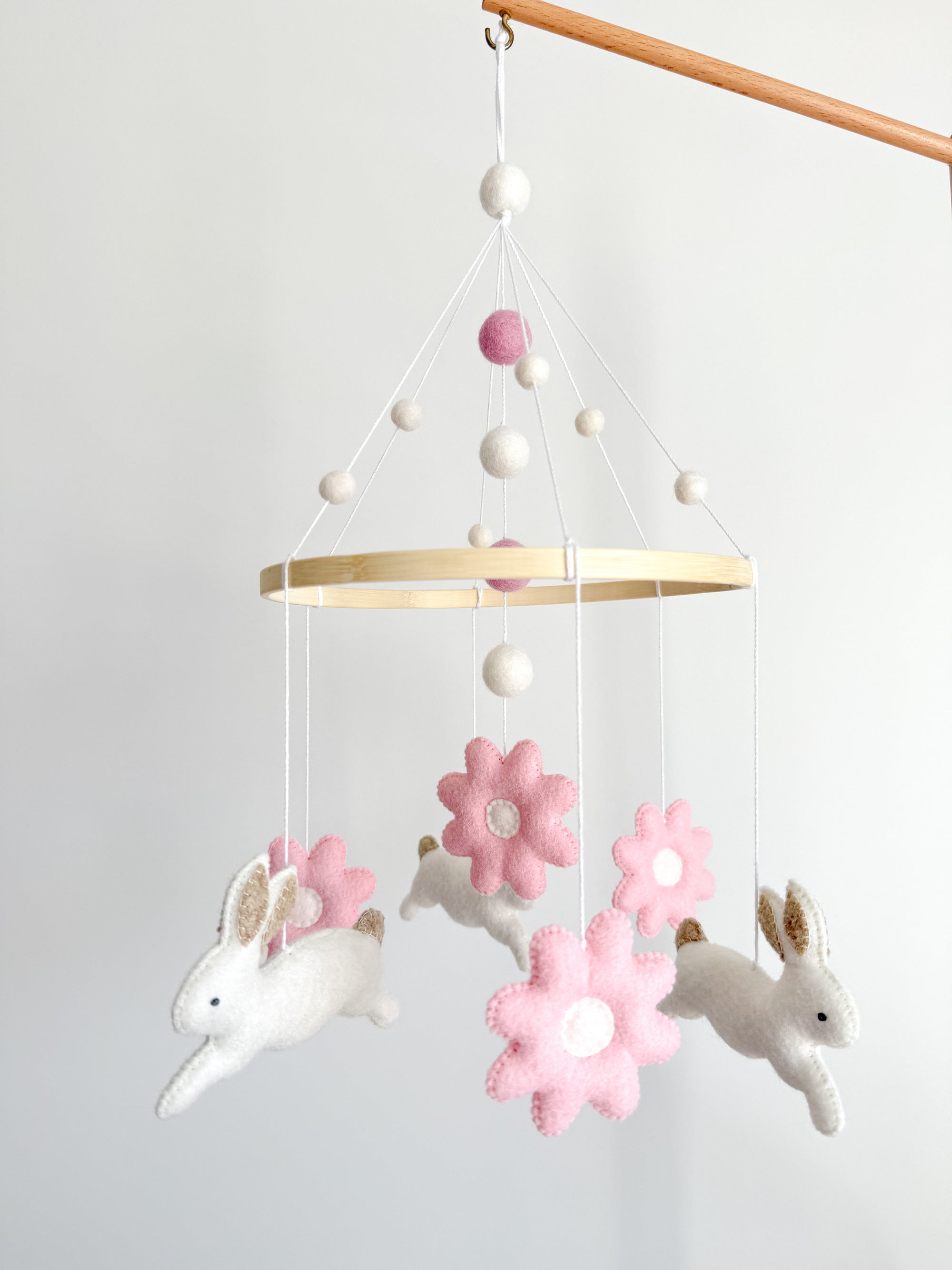 Bunny mobile with pink flowers