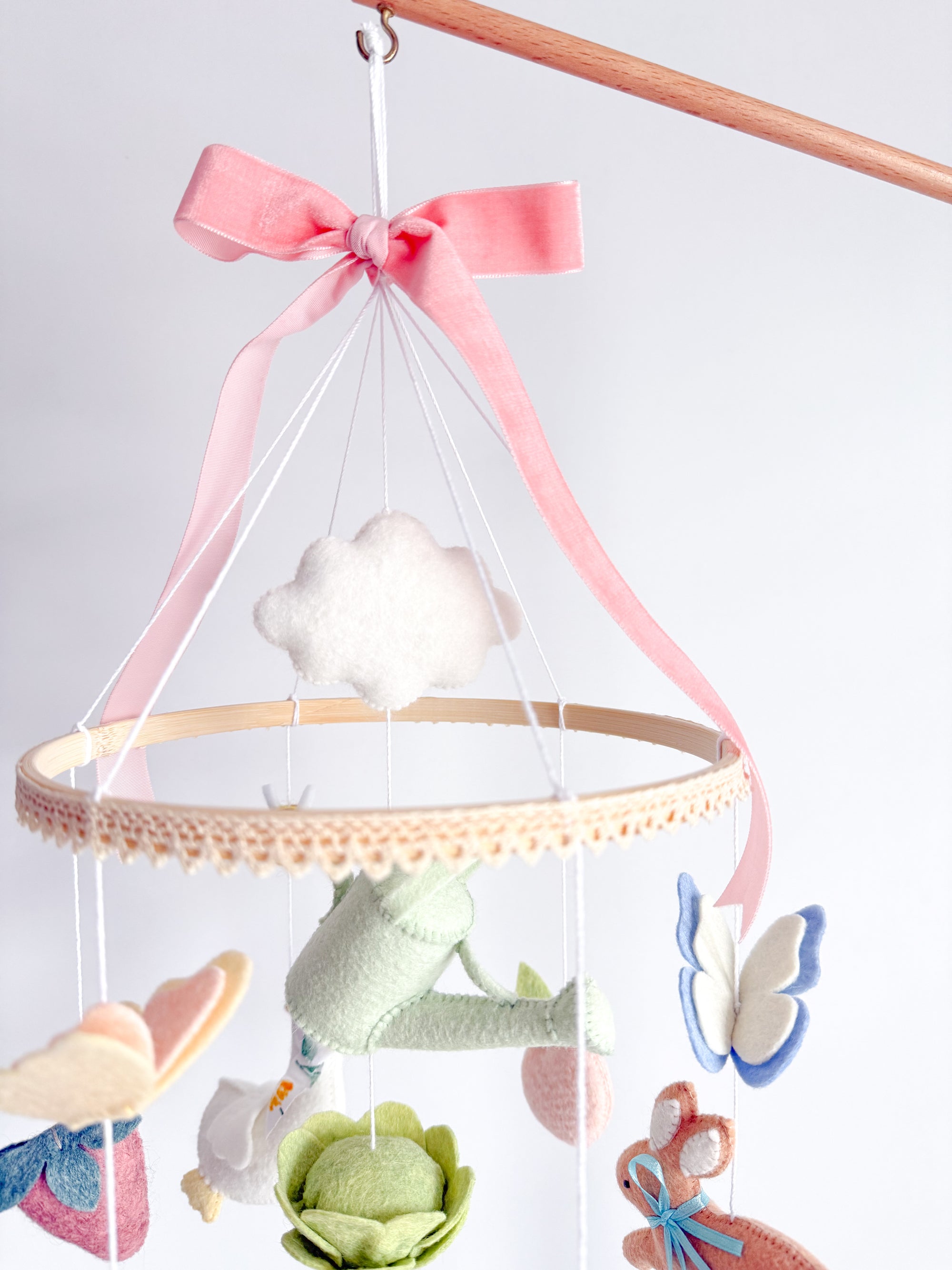 Garden rabbit mobile with pink bow