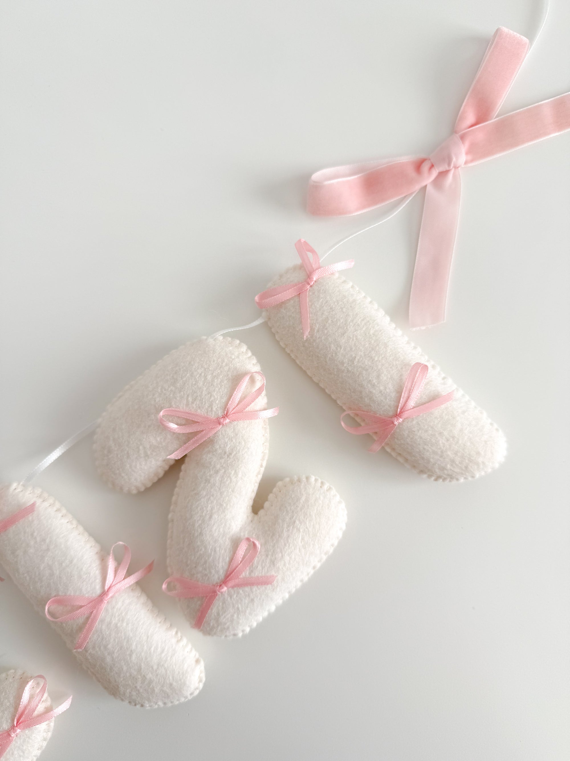Name banner with small bows