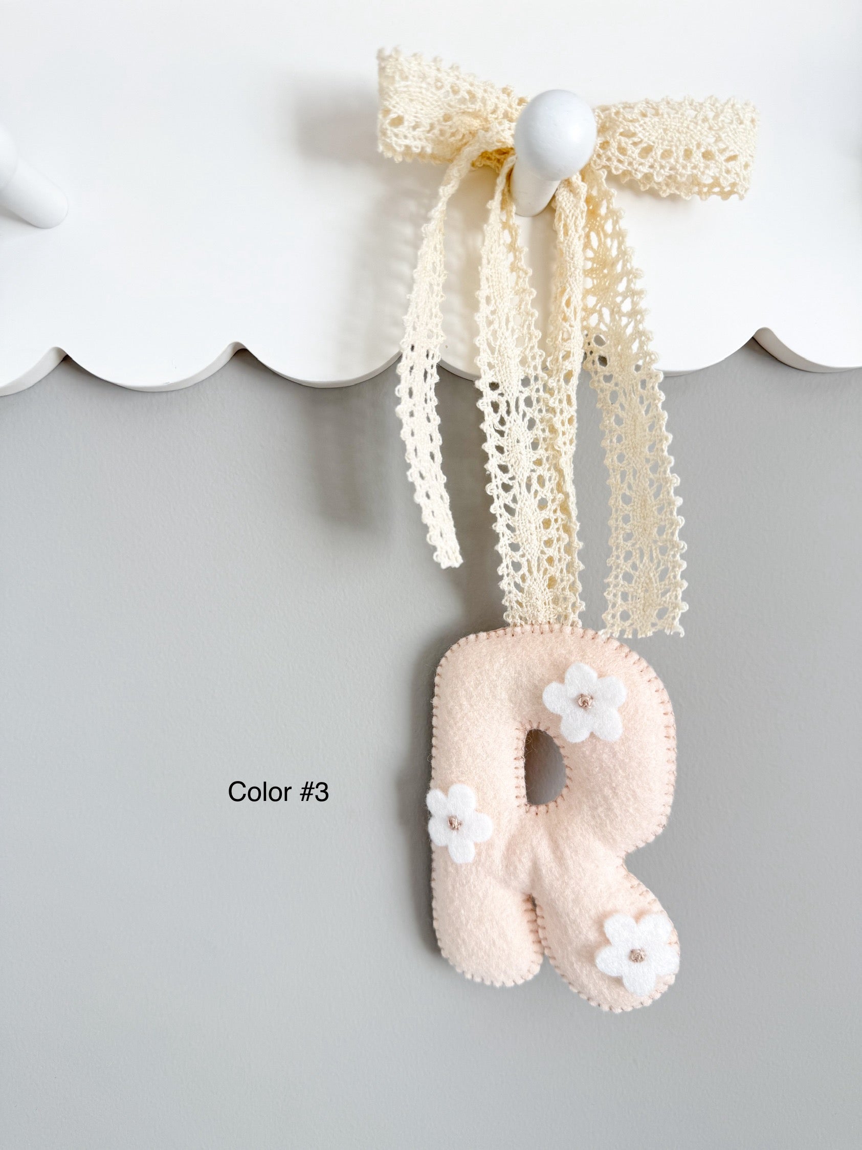 Felt letter with flowers