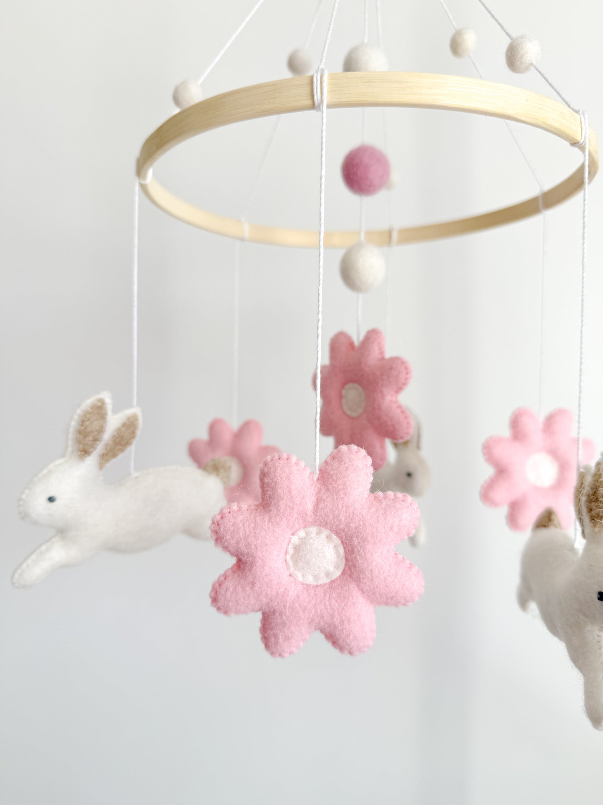 Bunny mobile with pink flowers