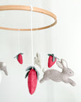 Minimalist bunny mobile with strawberries