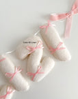 Name banner with small bows