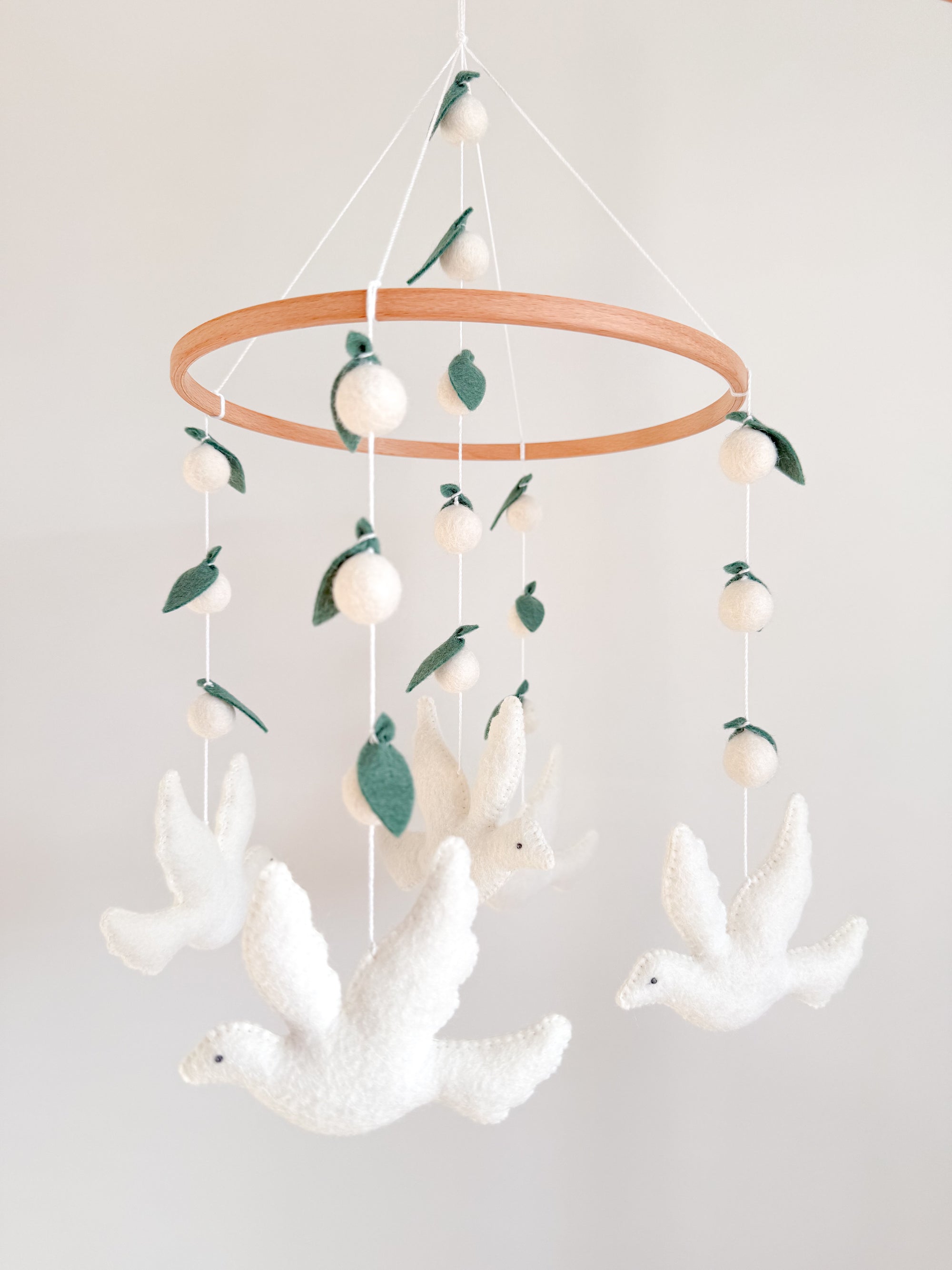 Dove mobile with leaves