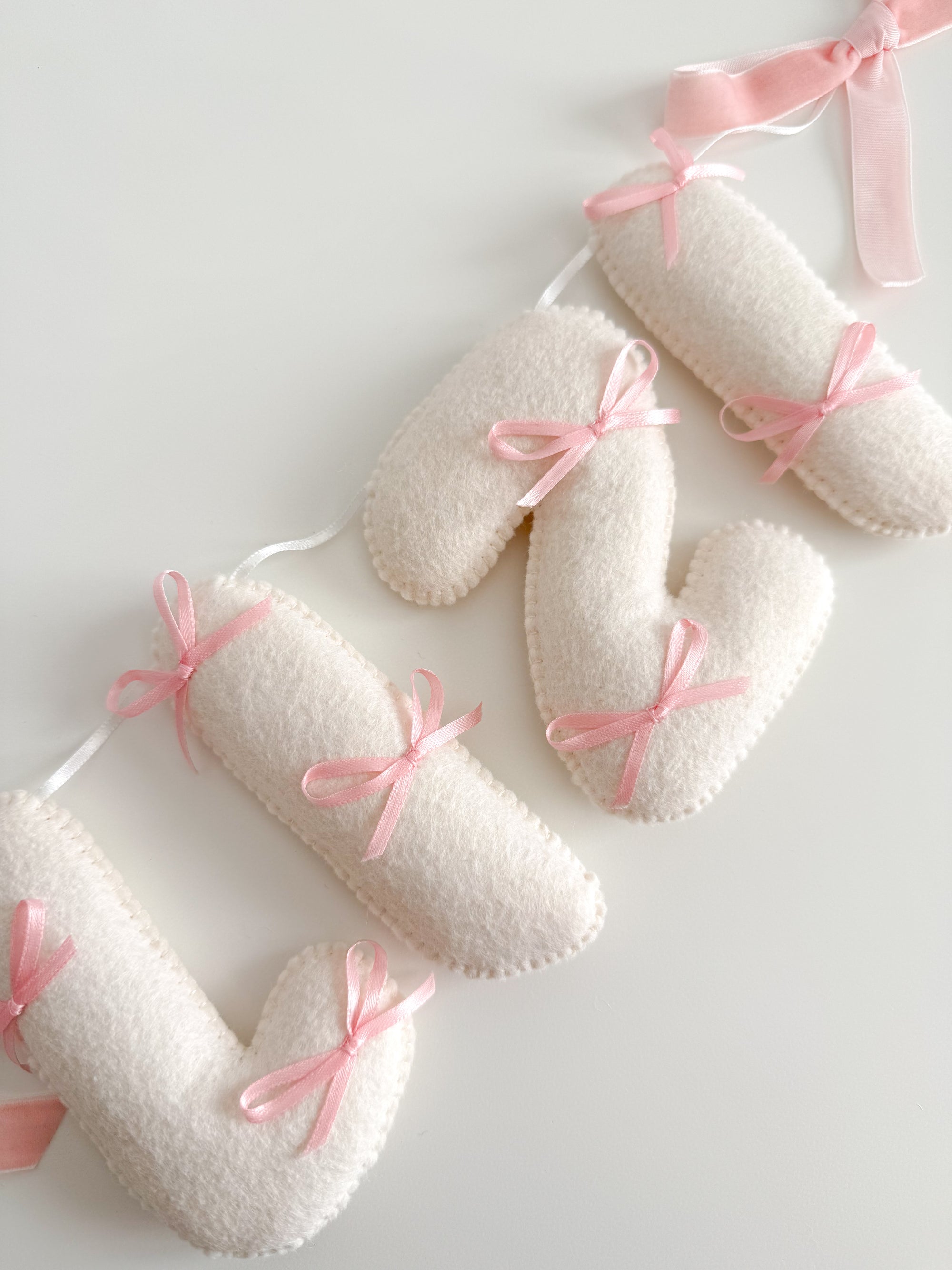 Name banner with small bows