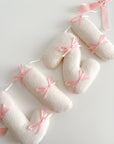 Name banner with small bows