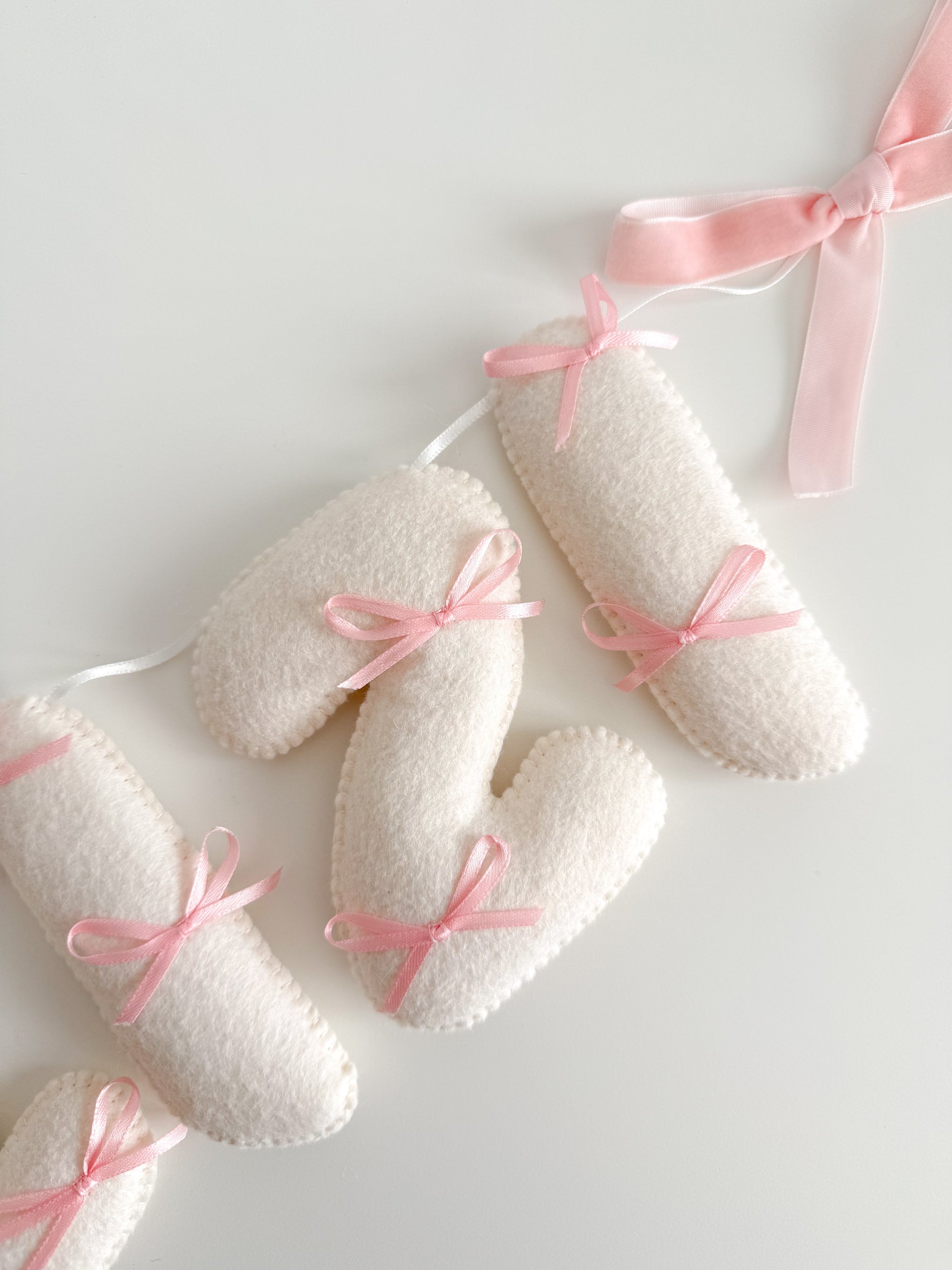 Name banner with small bows
