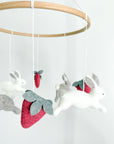 Minimalist bunny mobile with strawberries