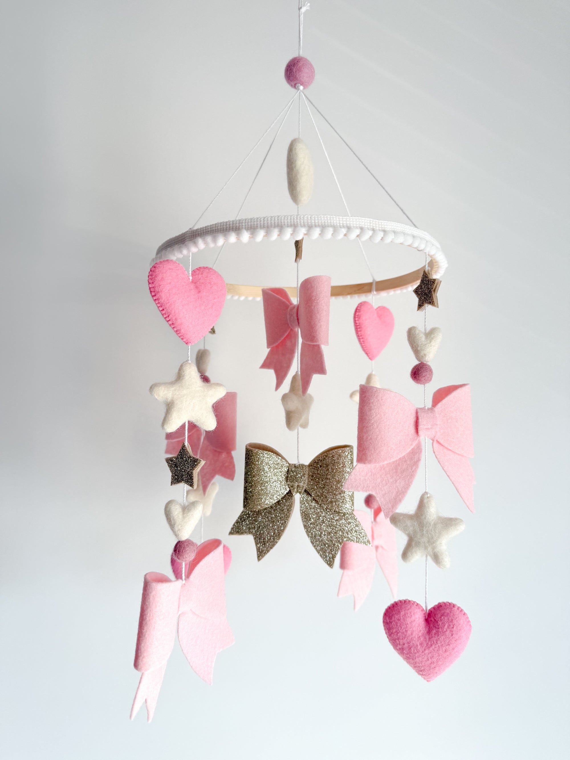 Bow mobile with glitter details