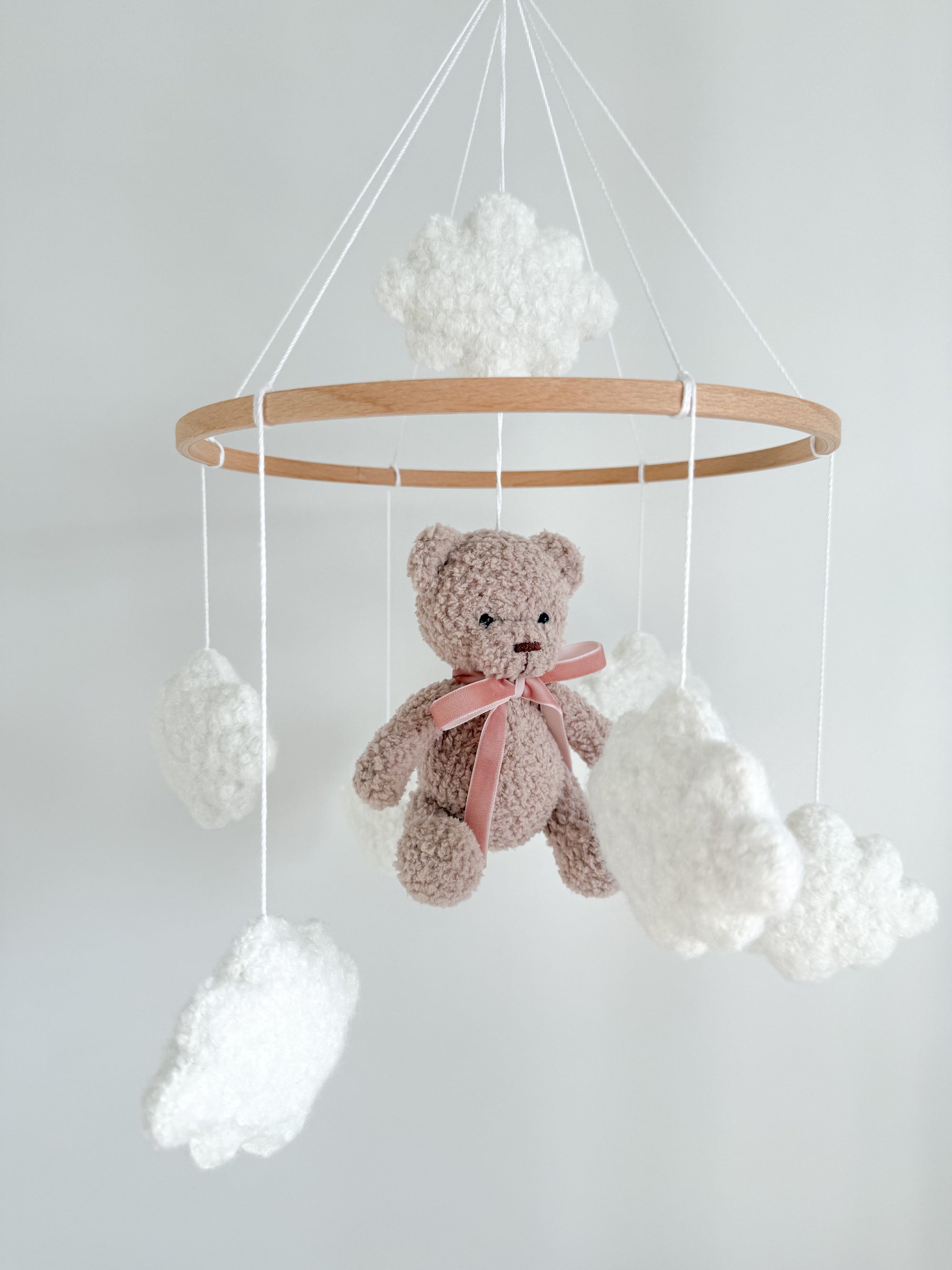 Boucle mobile with beige teddy bear