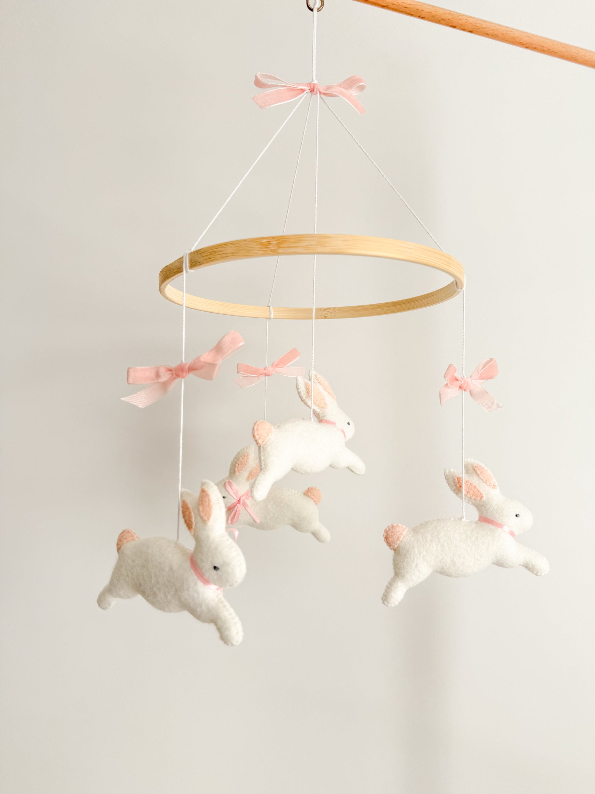 Bunny mobile with pink bows