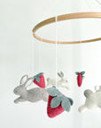Minimalist bunny mobile with strawberries