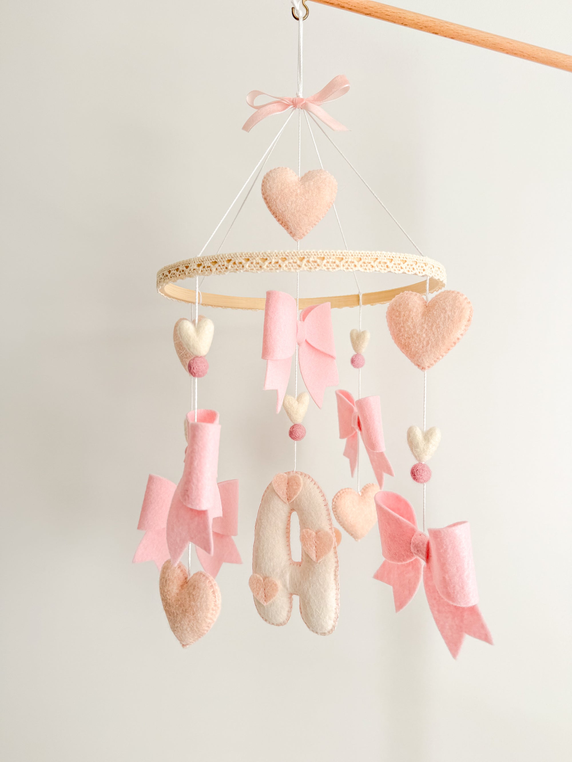 Mobile with bows and hearts