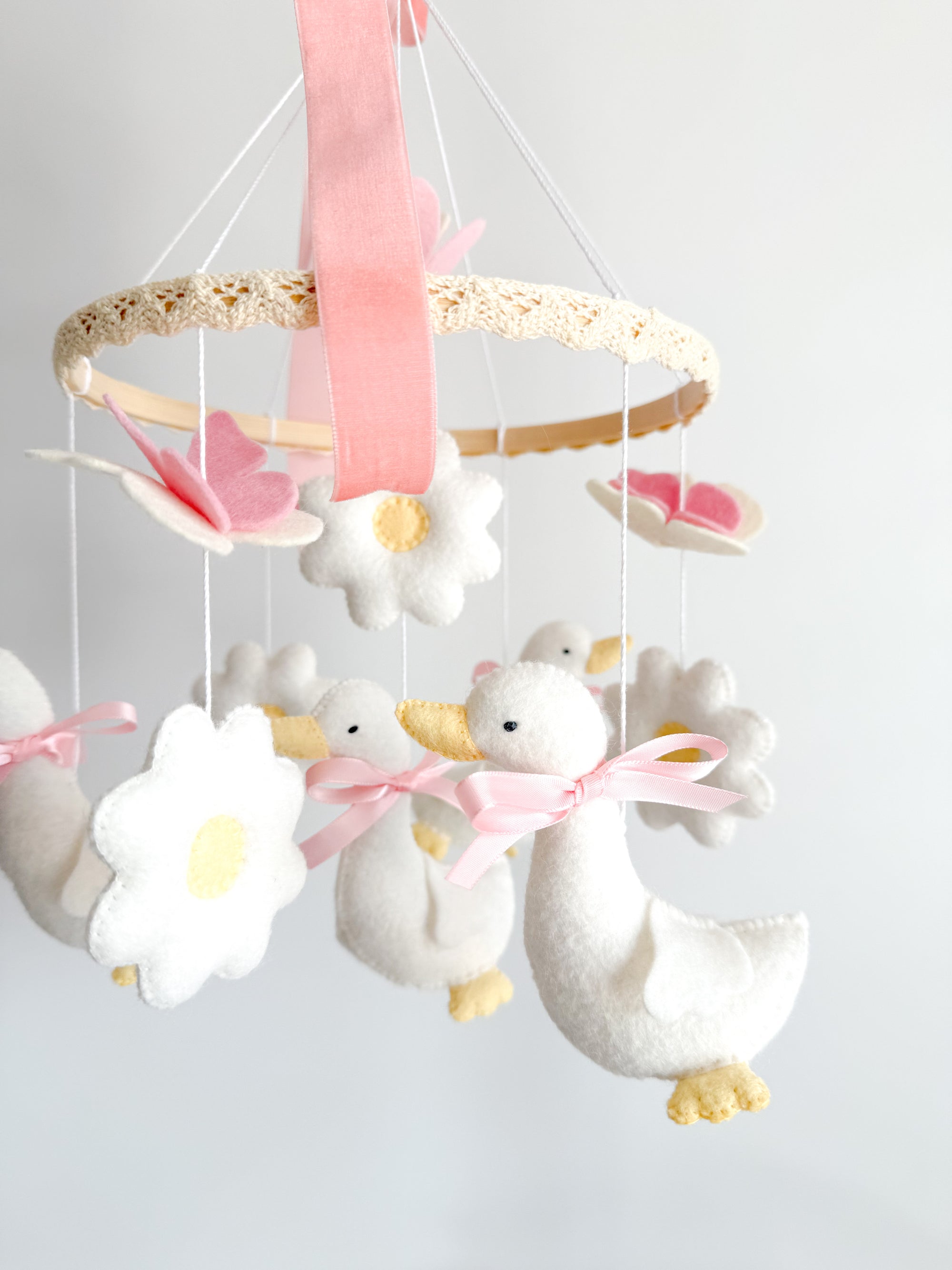 Pink mobile with goose