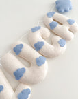 Name banner with clouds