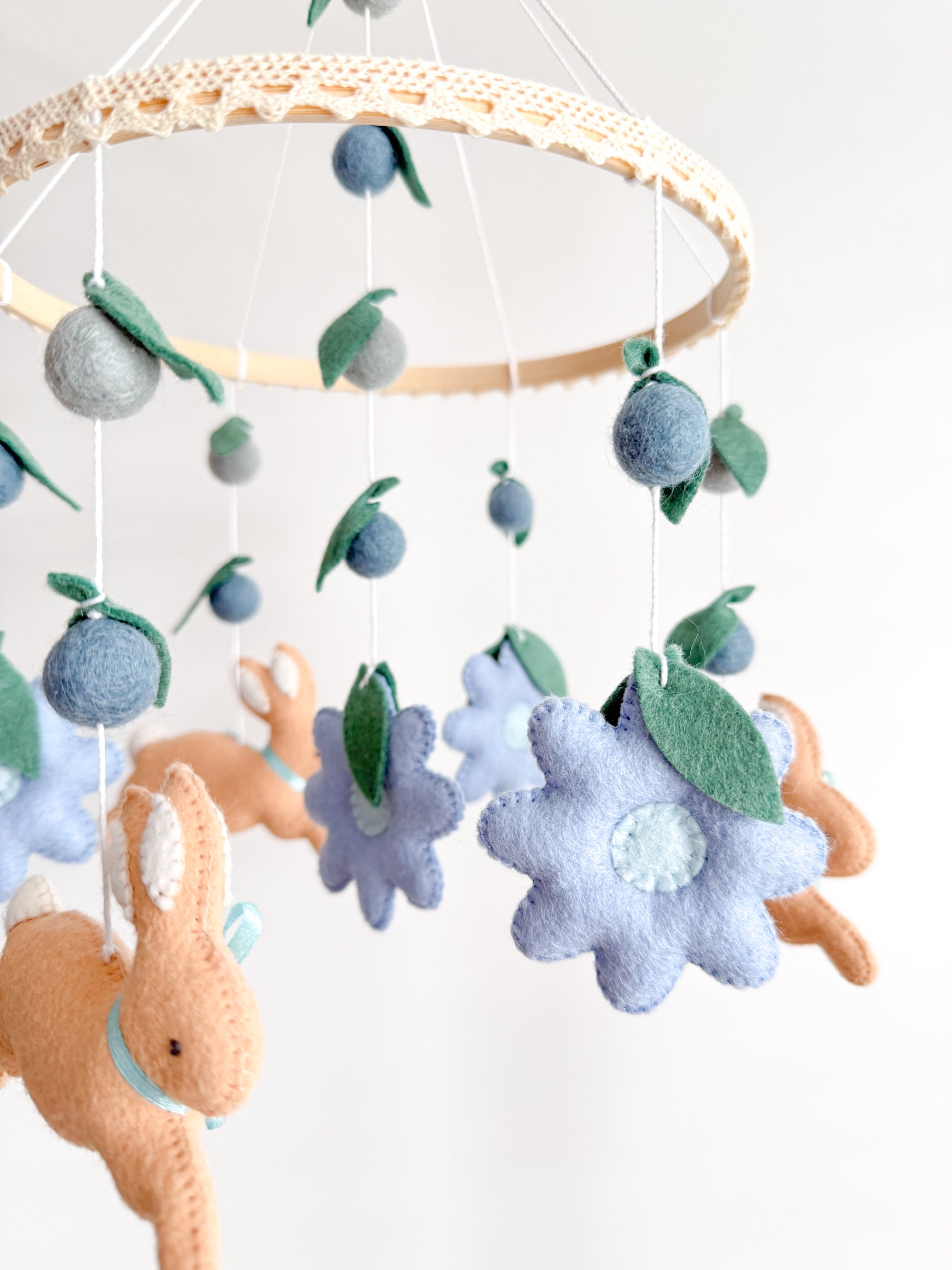 Rabbit mobile with blue flowers