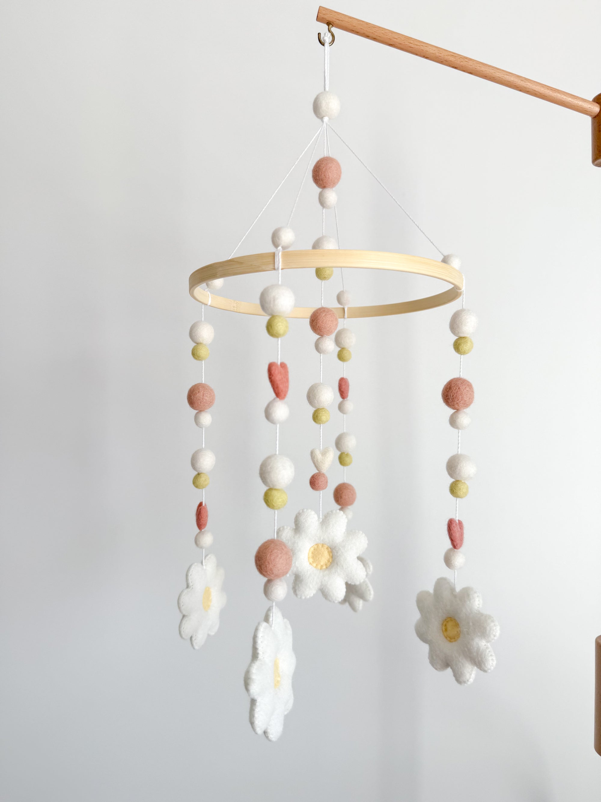 Mobile with daisies and small hearts