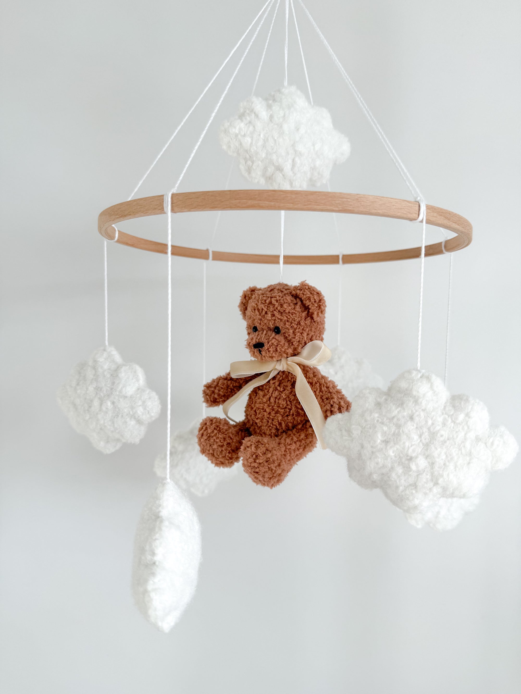 Boucle mobile with brown teddy bear