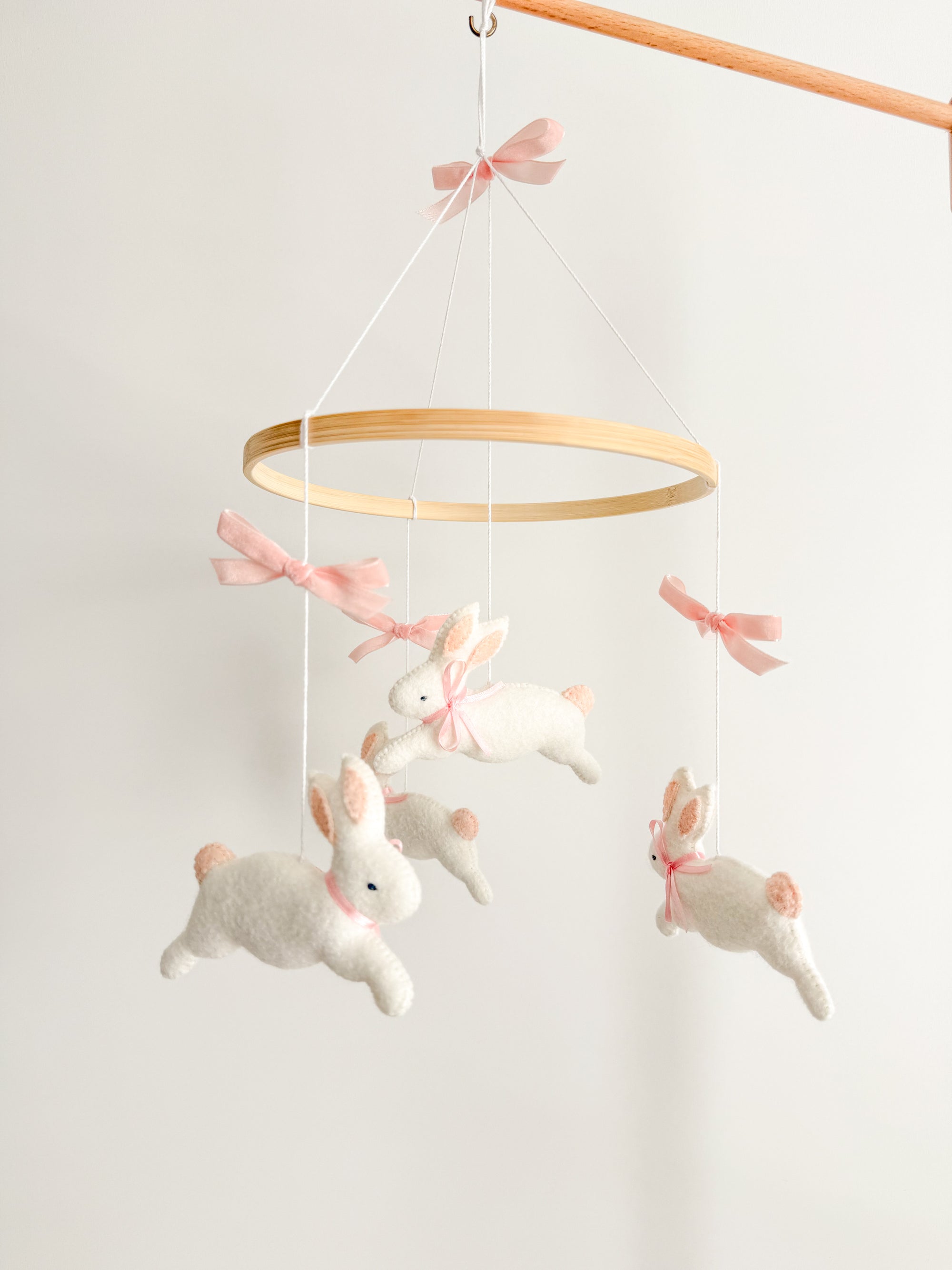 Bunny mobile with pink bows