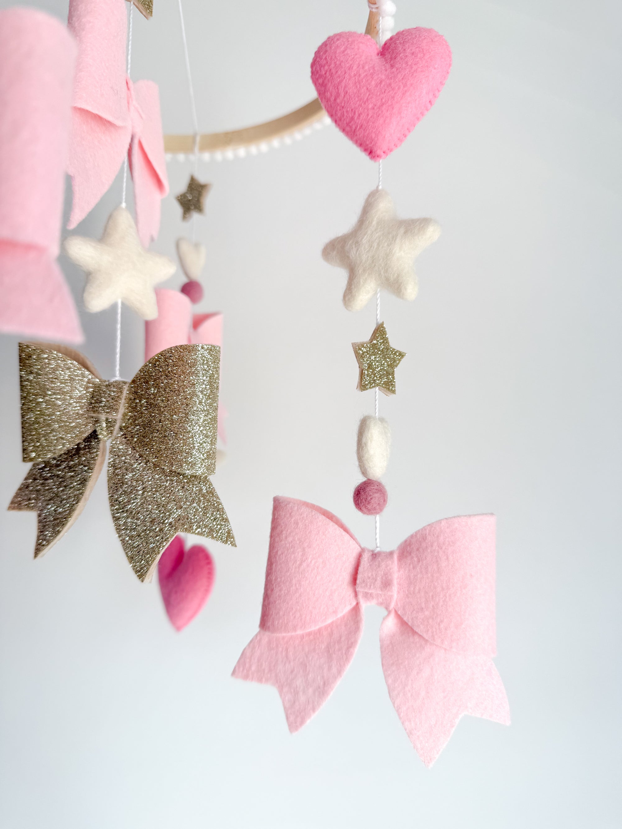 Bow mobile with glitter details
