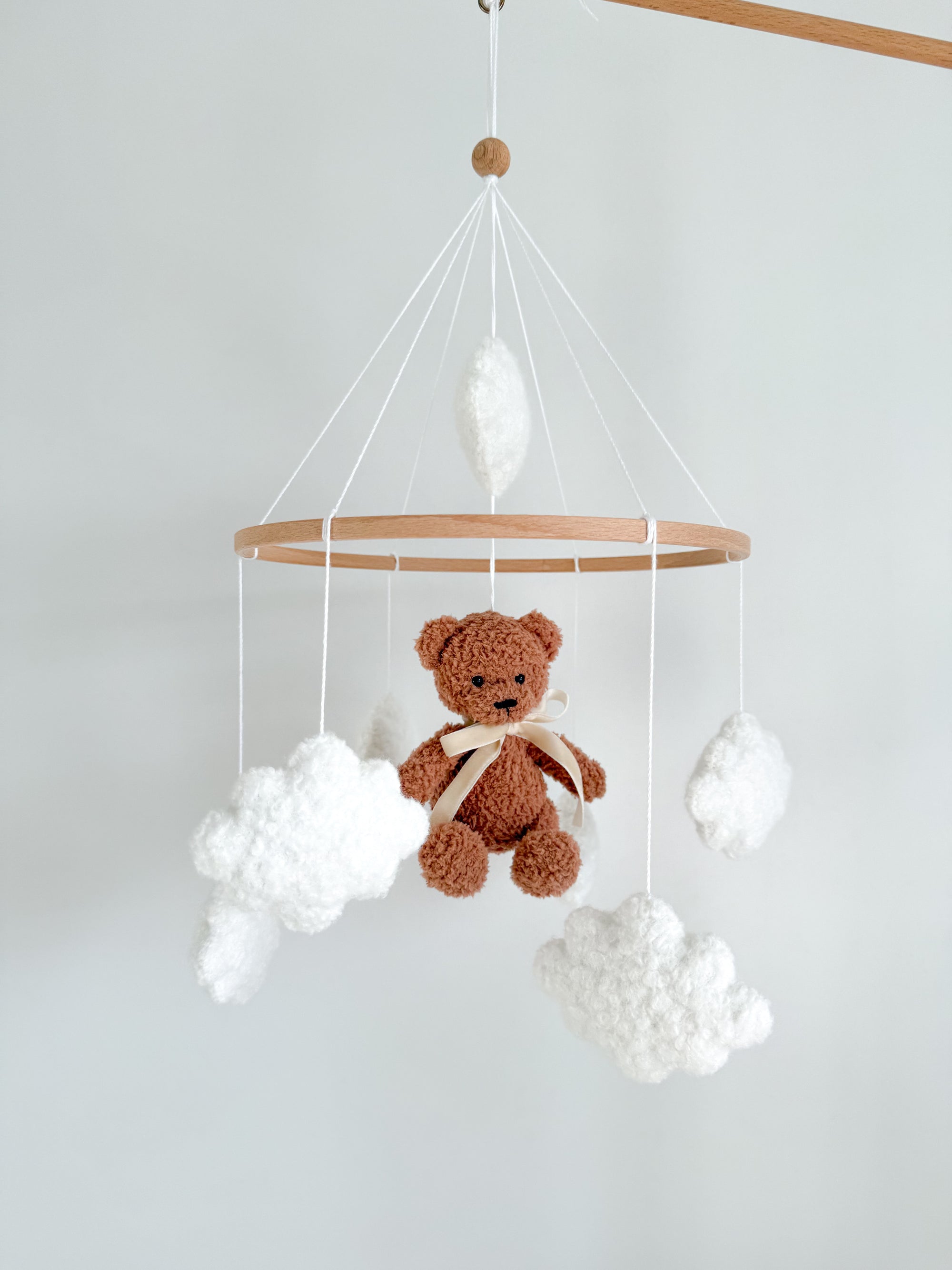 Boucle mobile with brown teddy bear