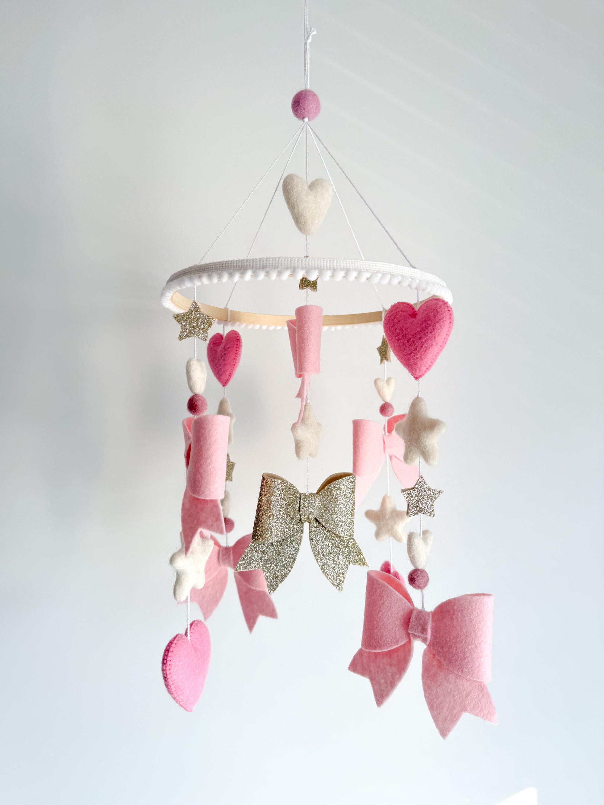 Bow mobile with glitter details
