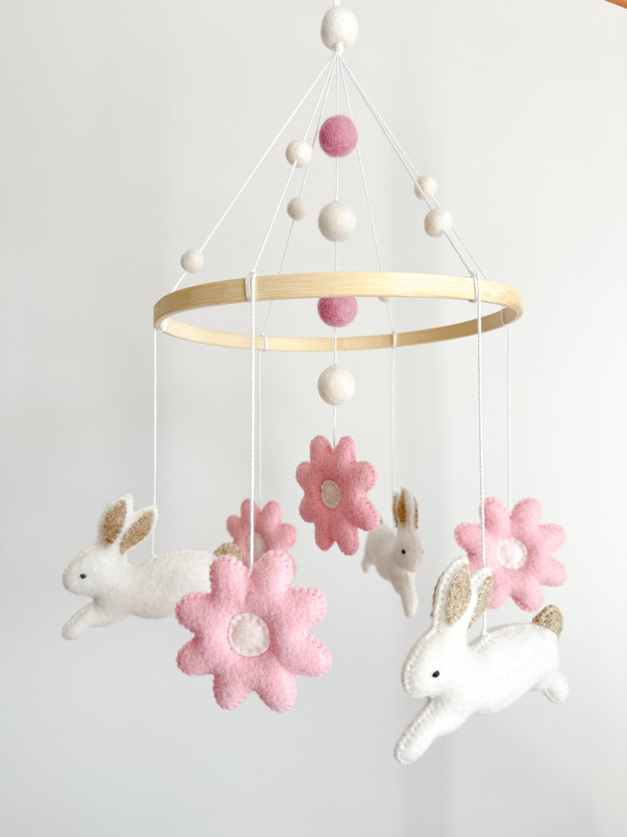 Bunny mobile with pink flowers