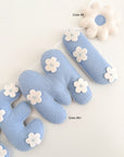 Name banner with blue flowers