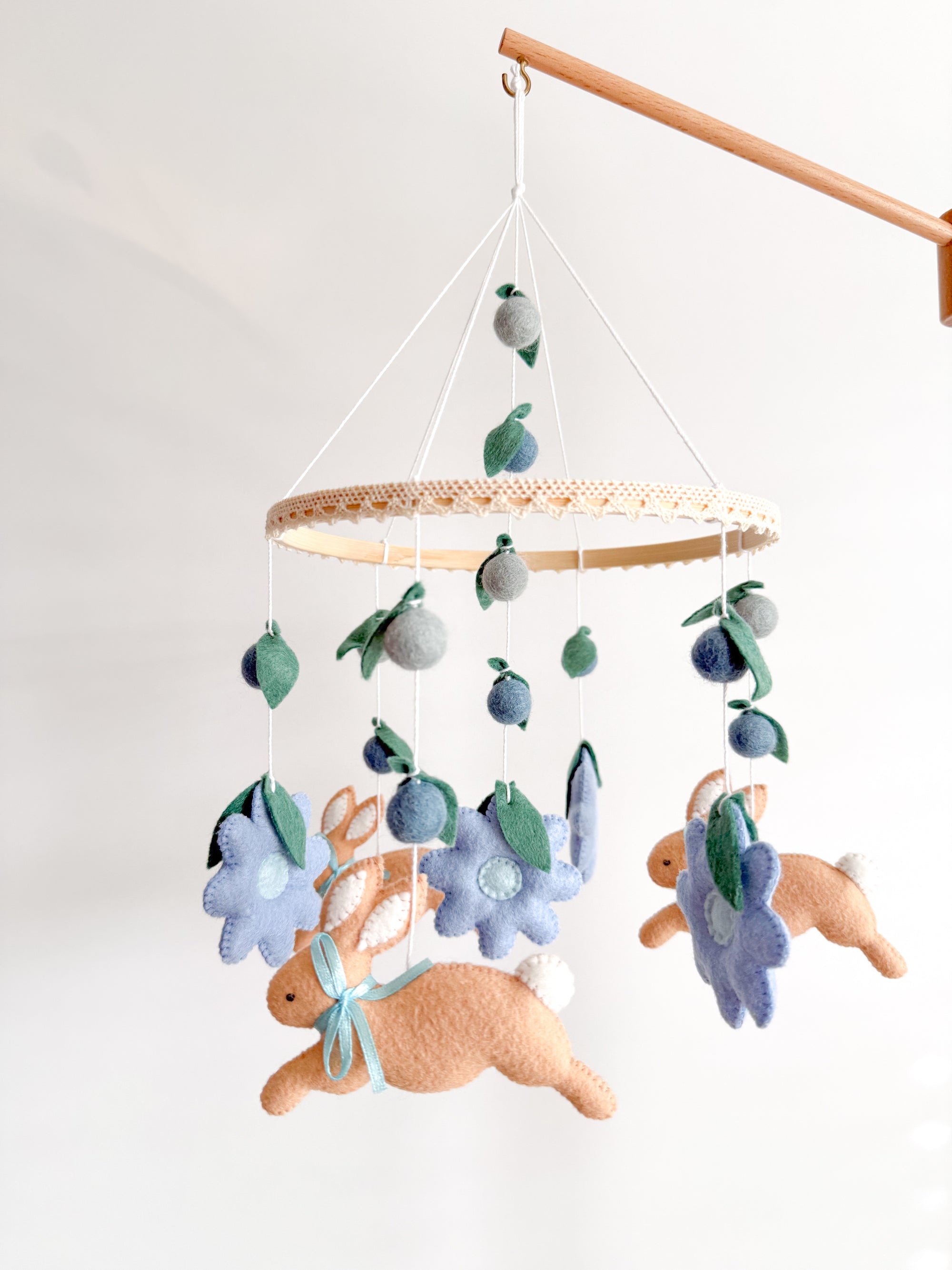 Rabbit mobile with blue flowers