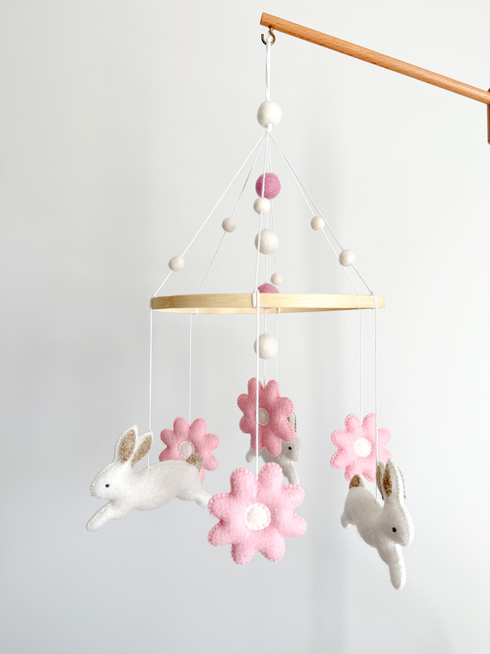 Bunny mobile with pink flowers