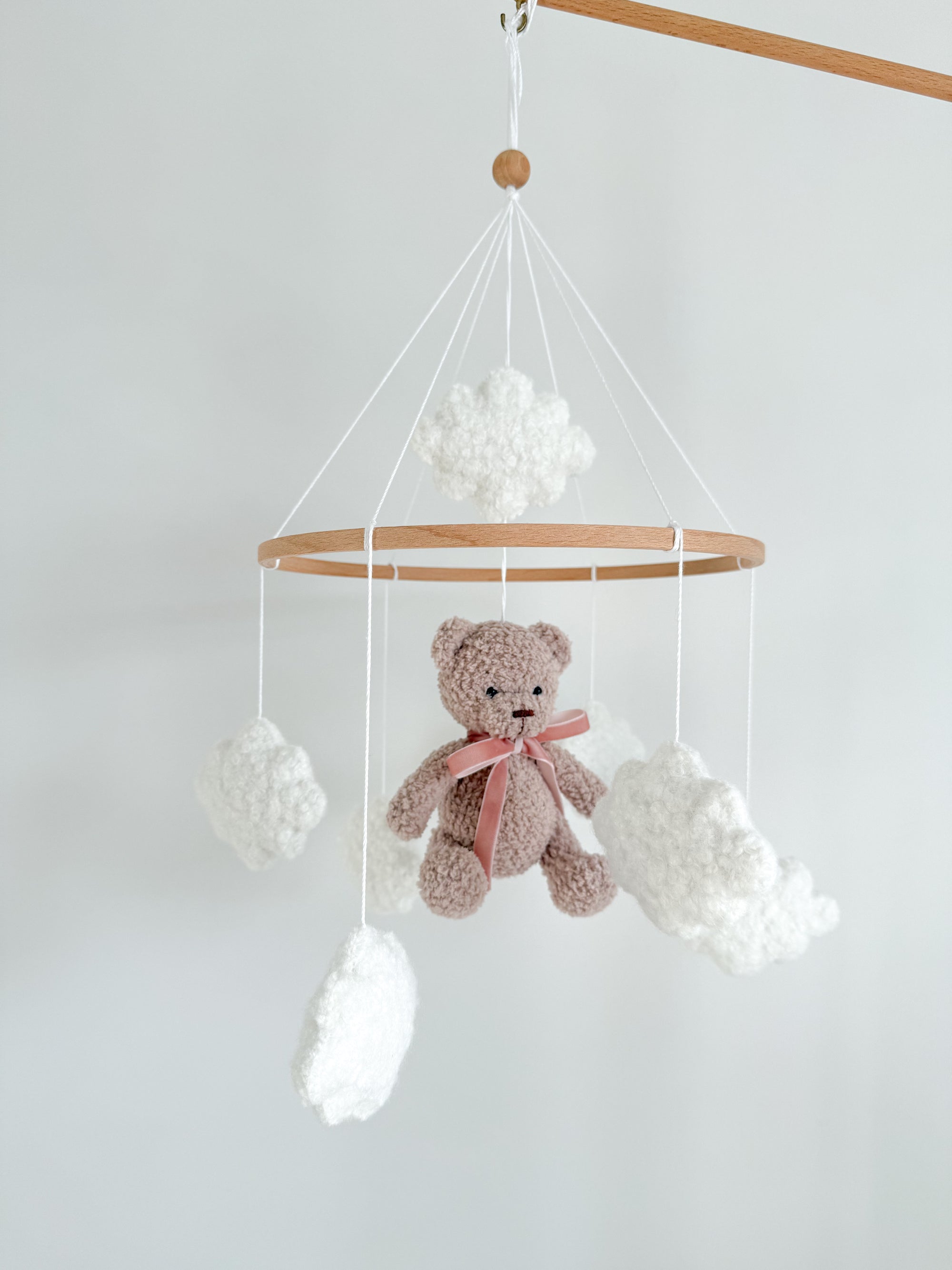 Boucle mobile with beige teddy bear