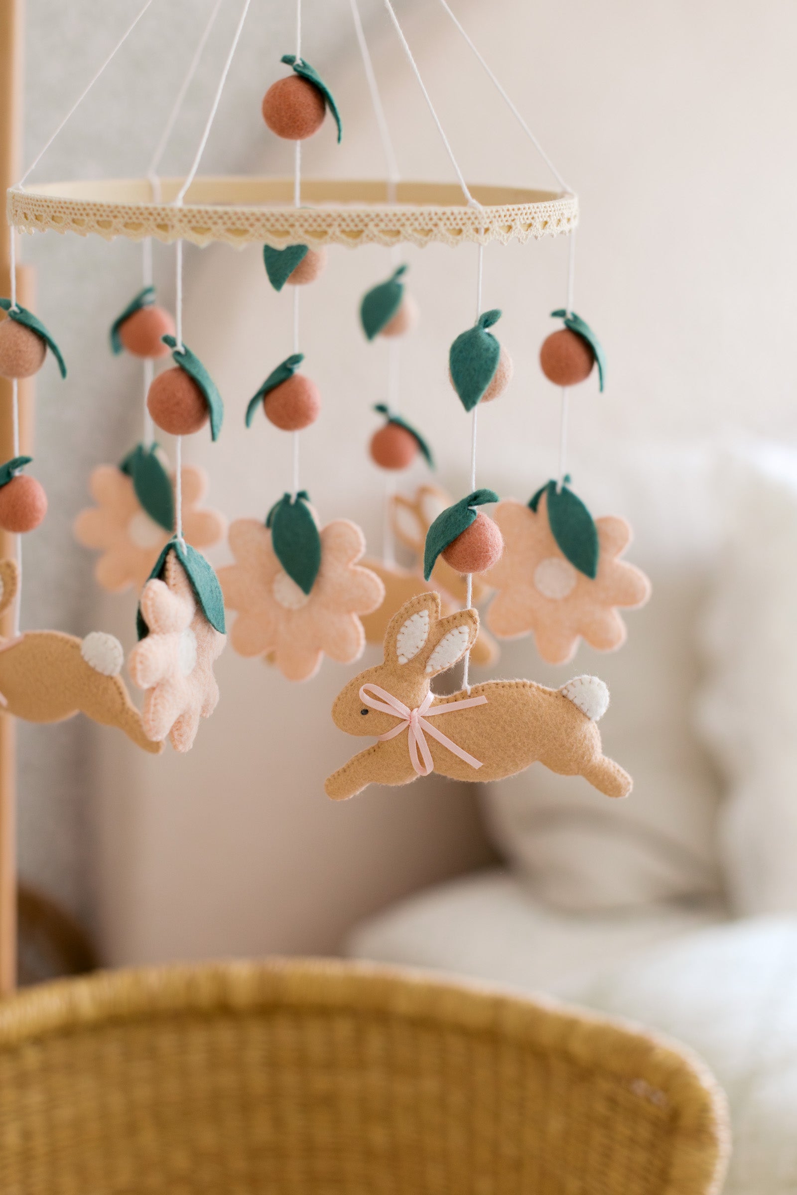 Rabbit mobile with pink flowers