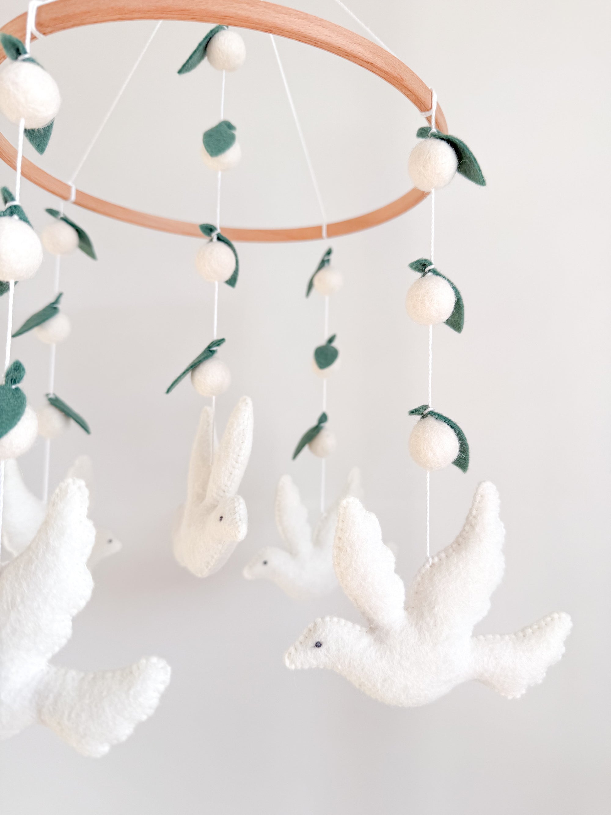 Dove mobile with leaves
