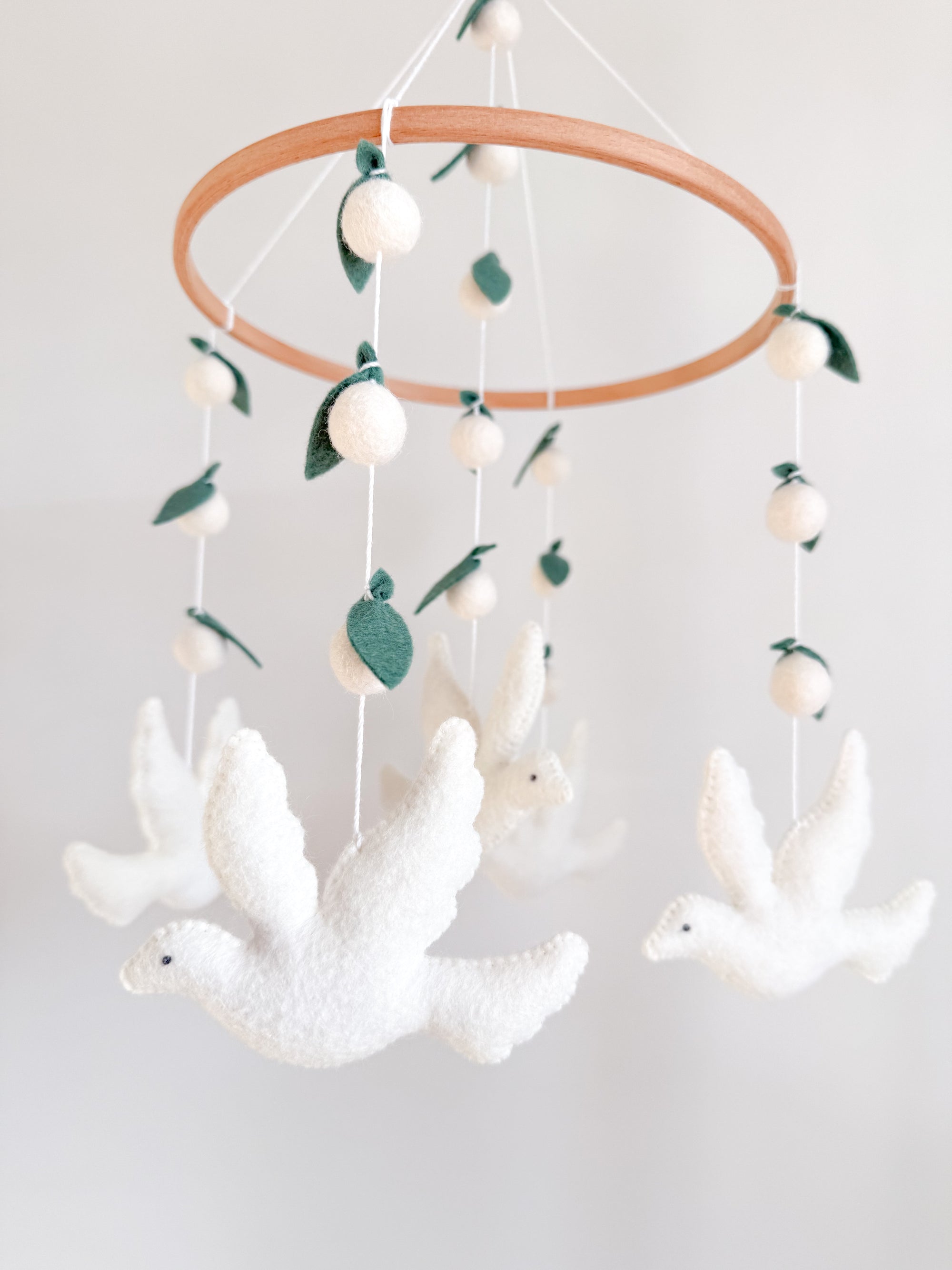Dove mobile with leaves