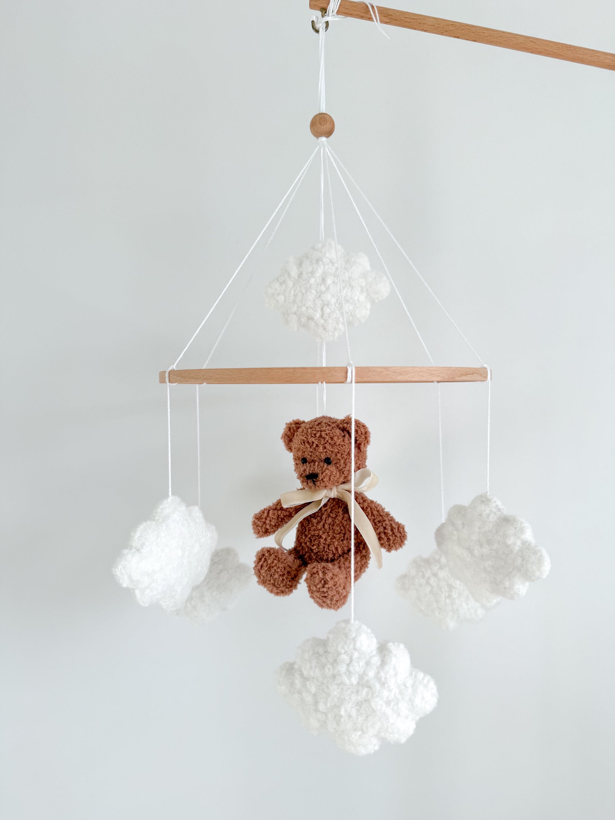 Boucle mobile with brown teddy bear