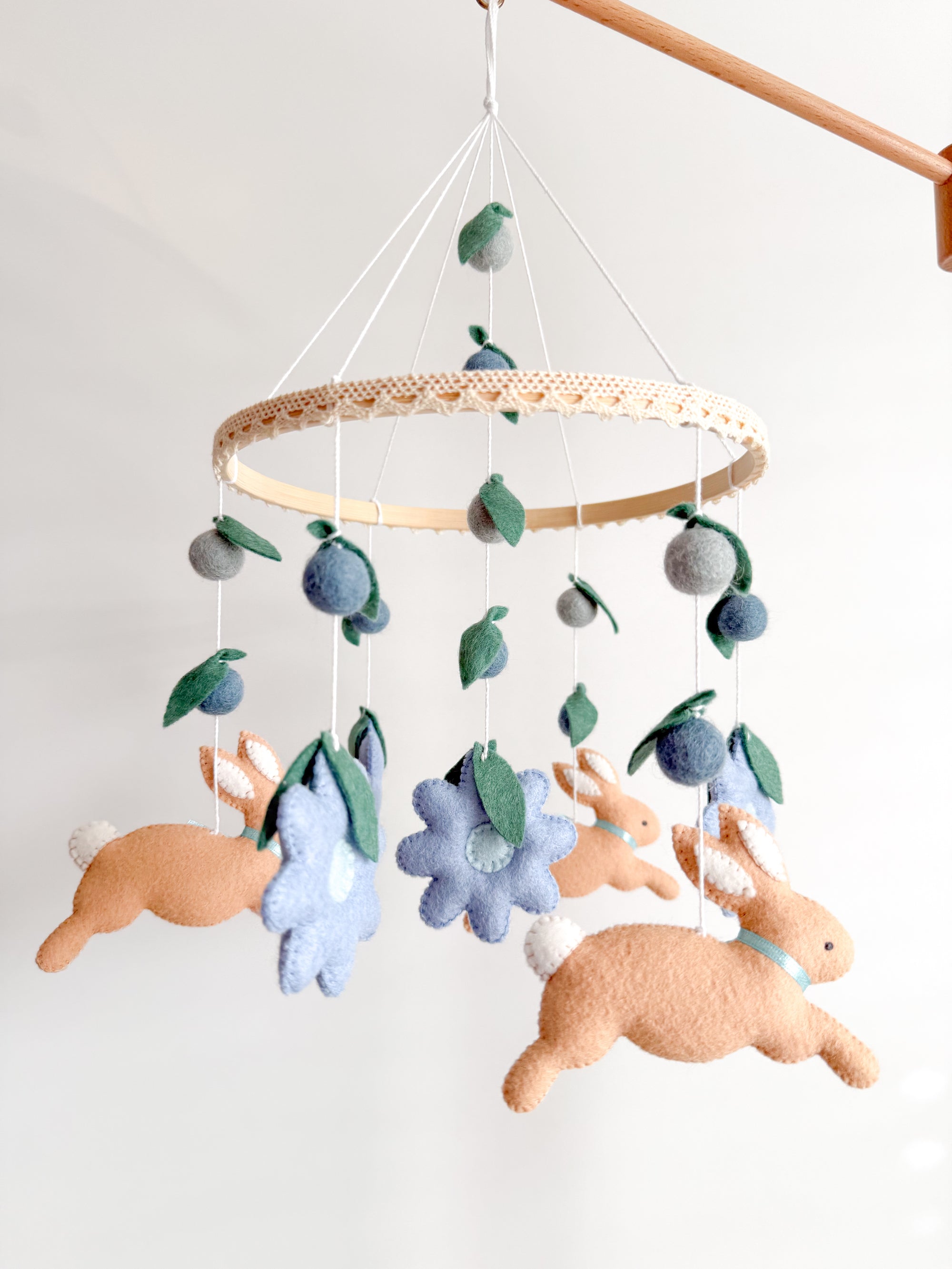 Rabbit mobile with blue flowers