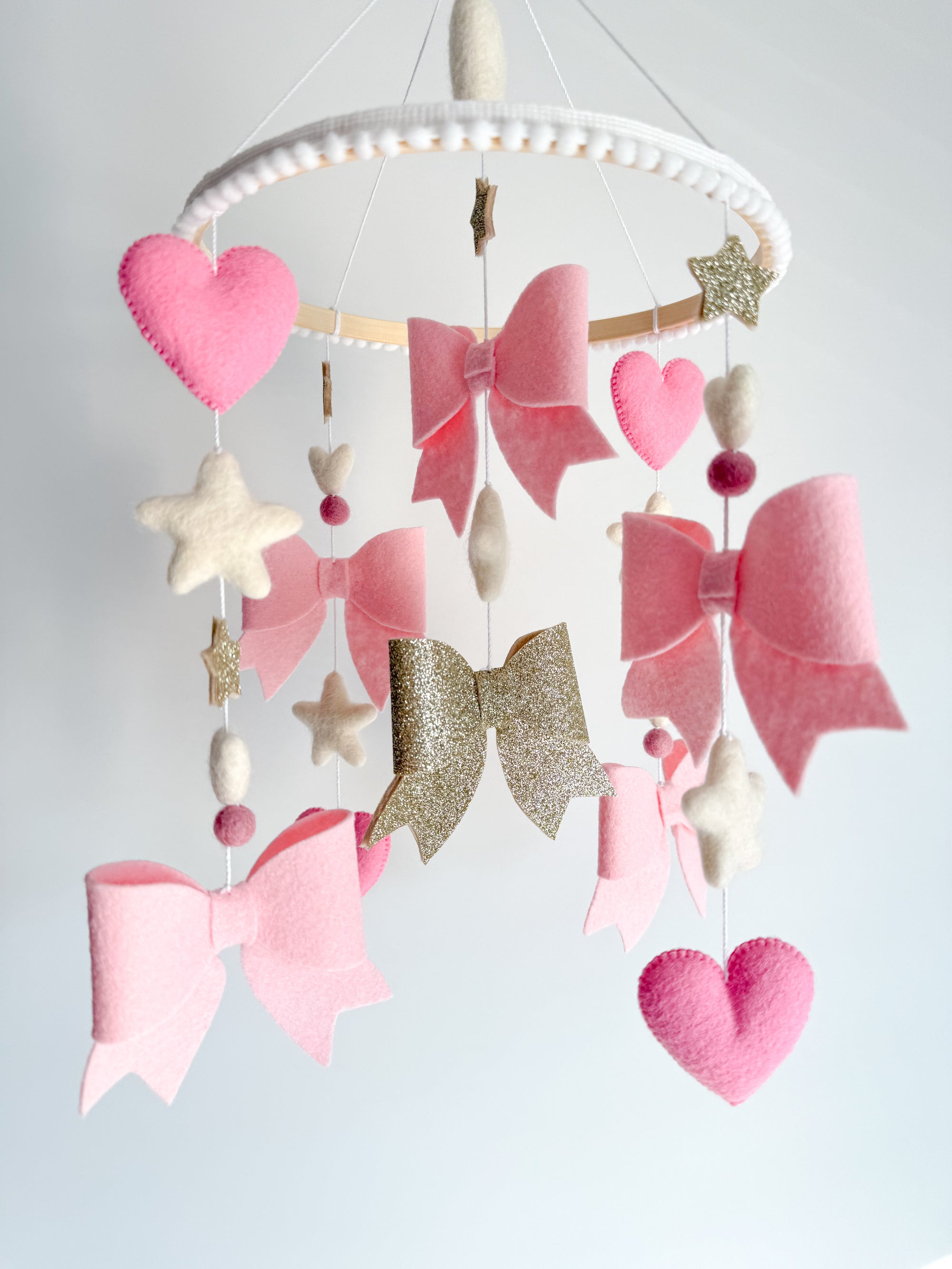 Bow mobile with glitter details