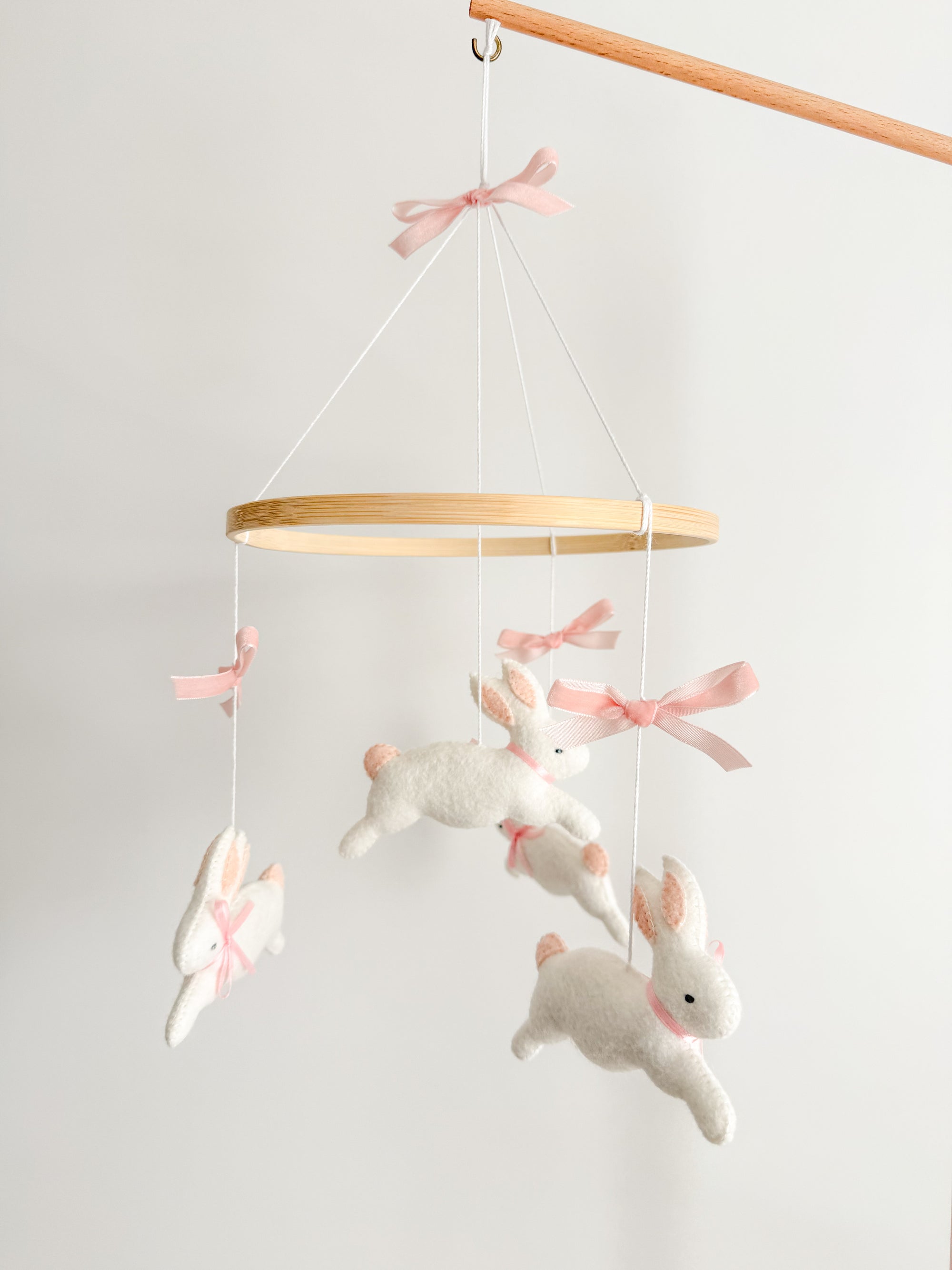 Bunny mobile with pink bows