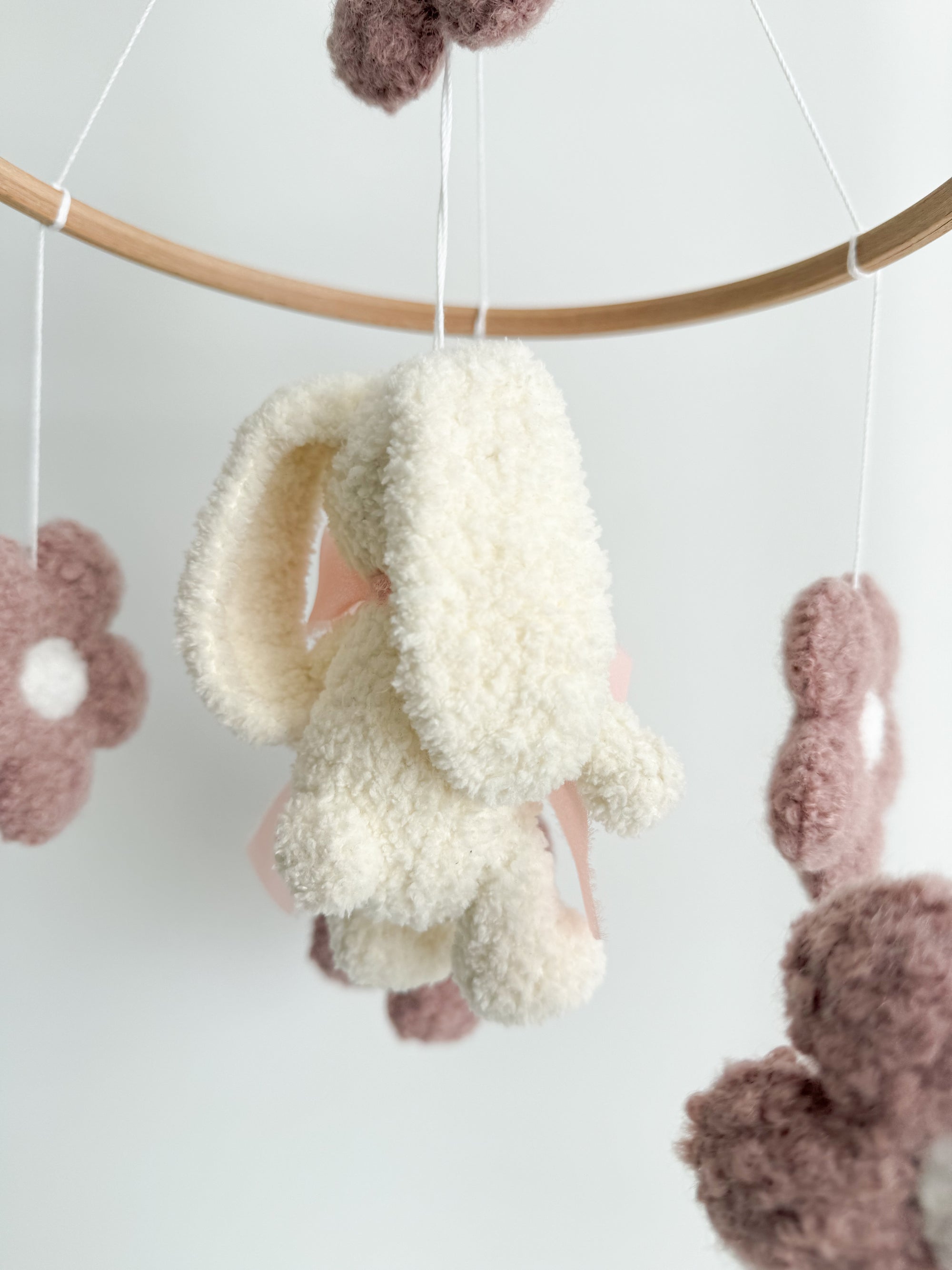 Boucle mobile with ivory bunny and flowers