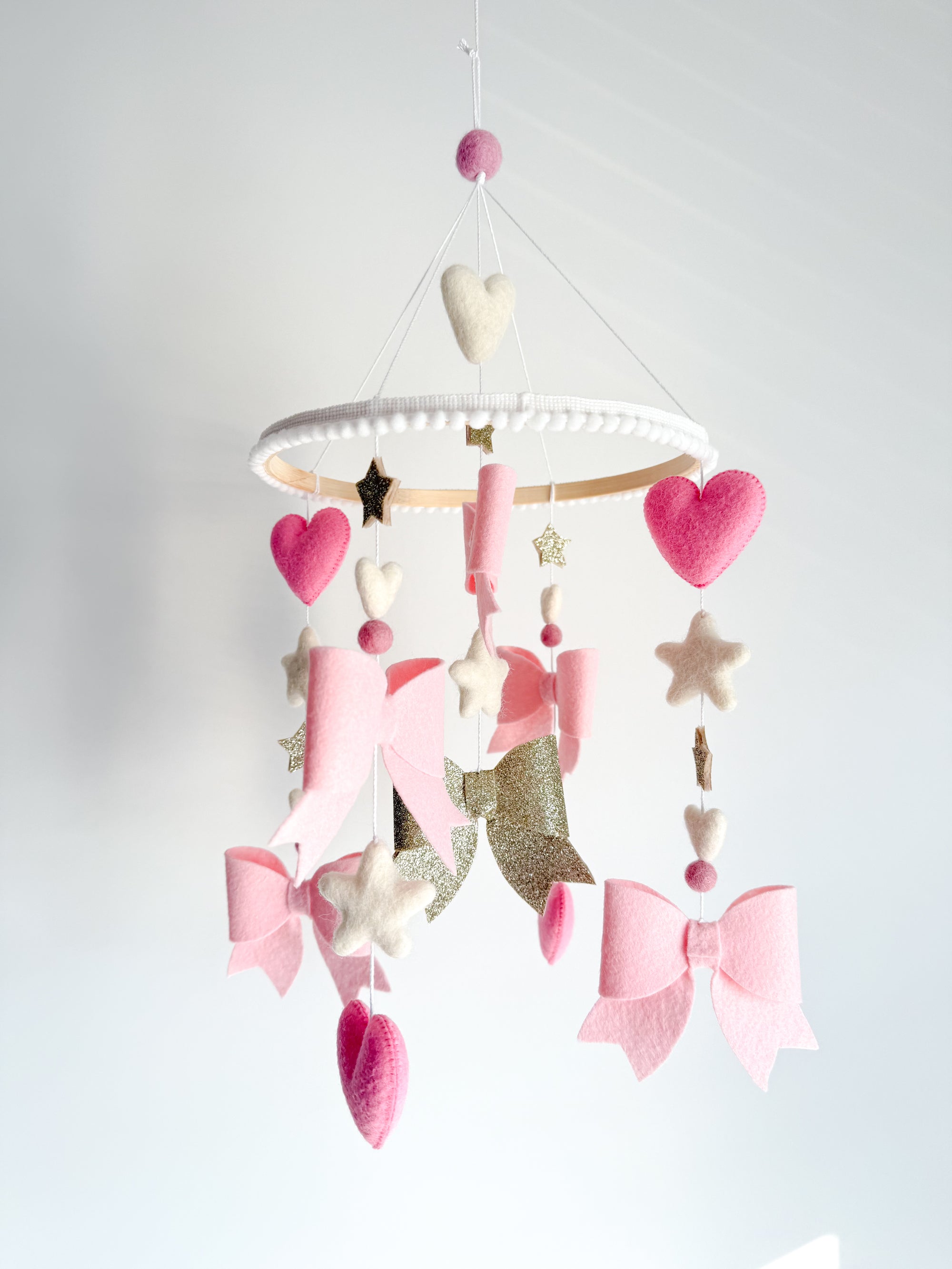 Bow mobile with glitter details