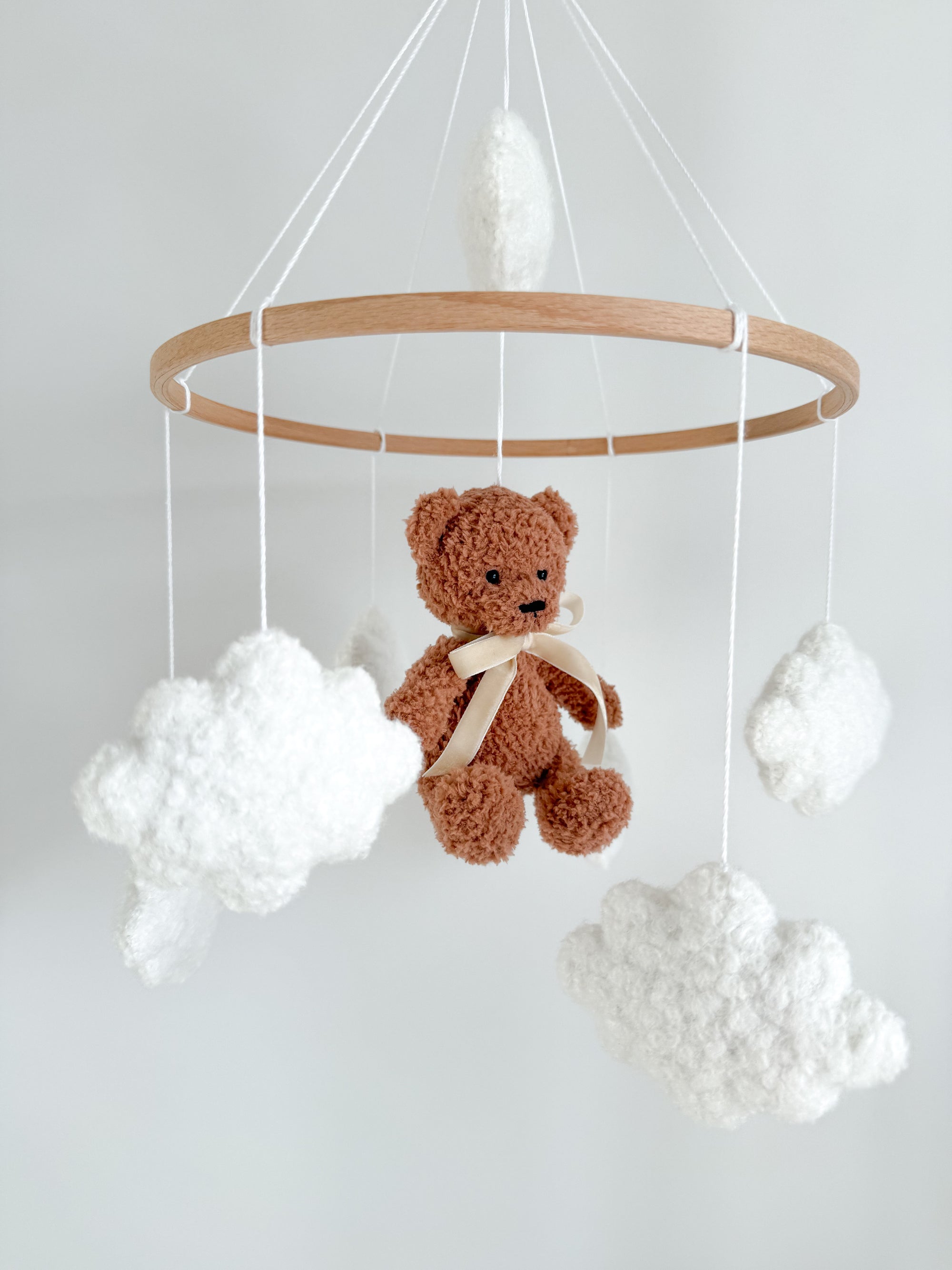 Boucle mobile with brown teddy bear
