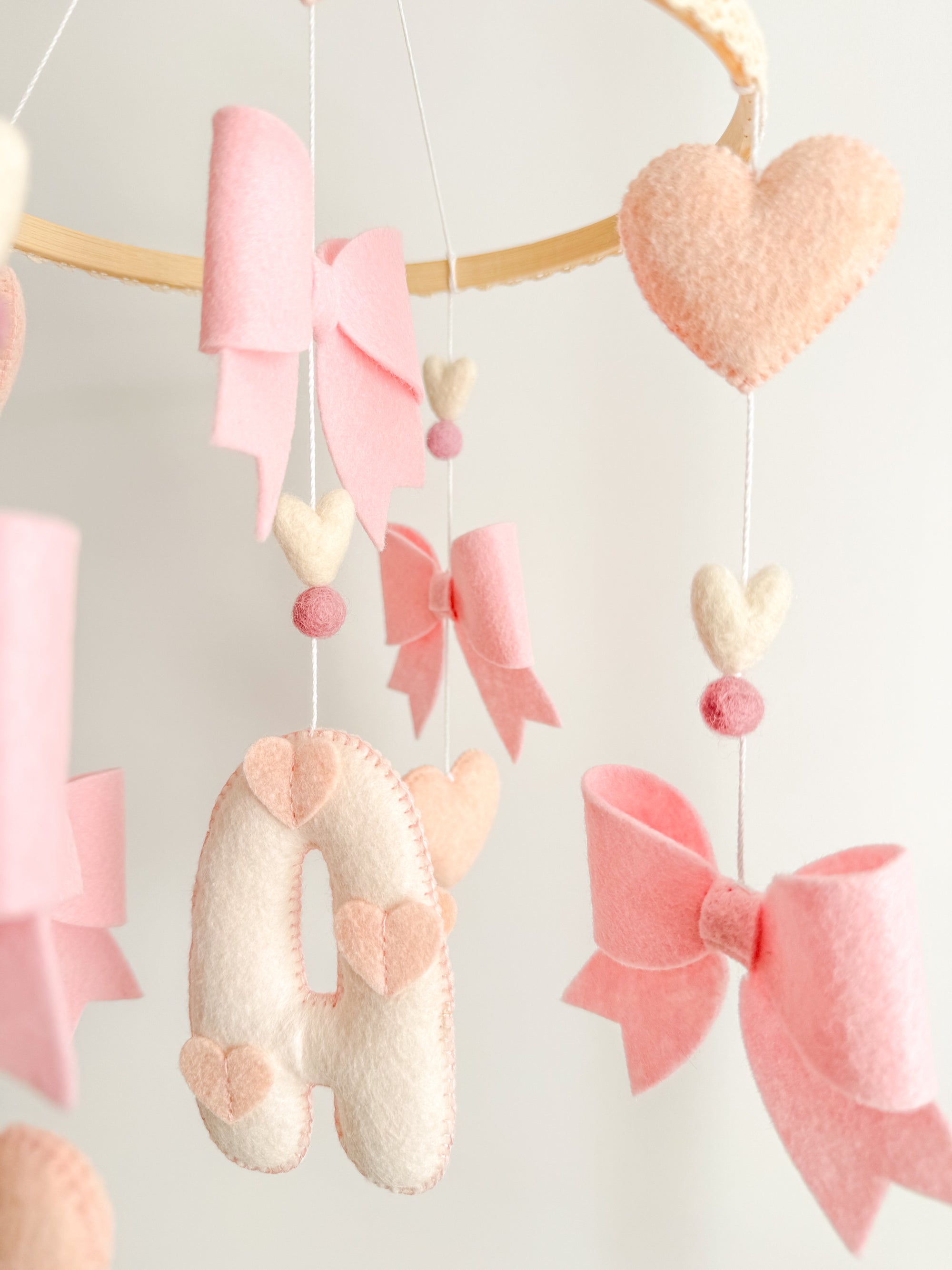 Mobile with bows and hearts