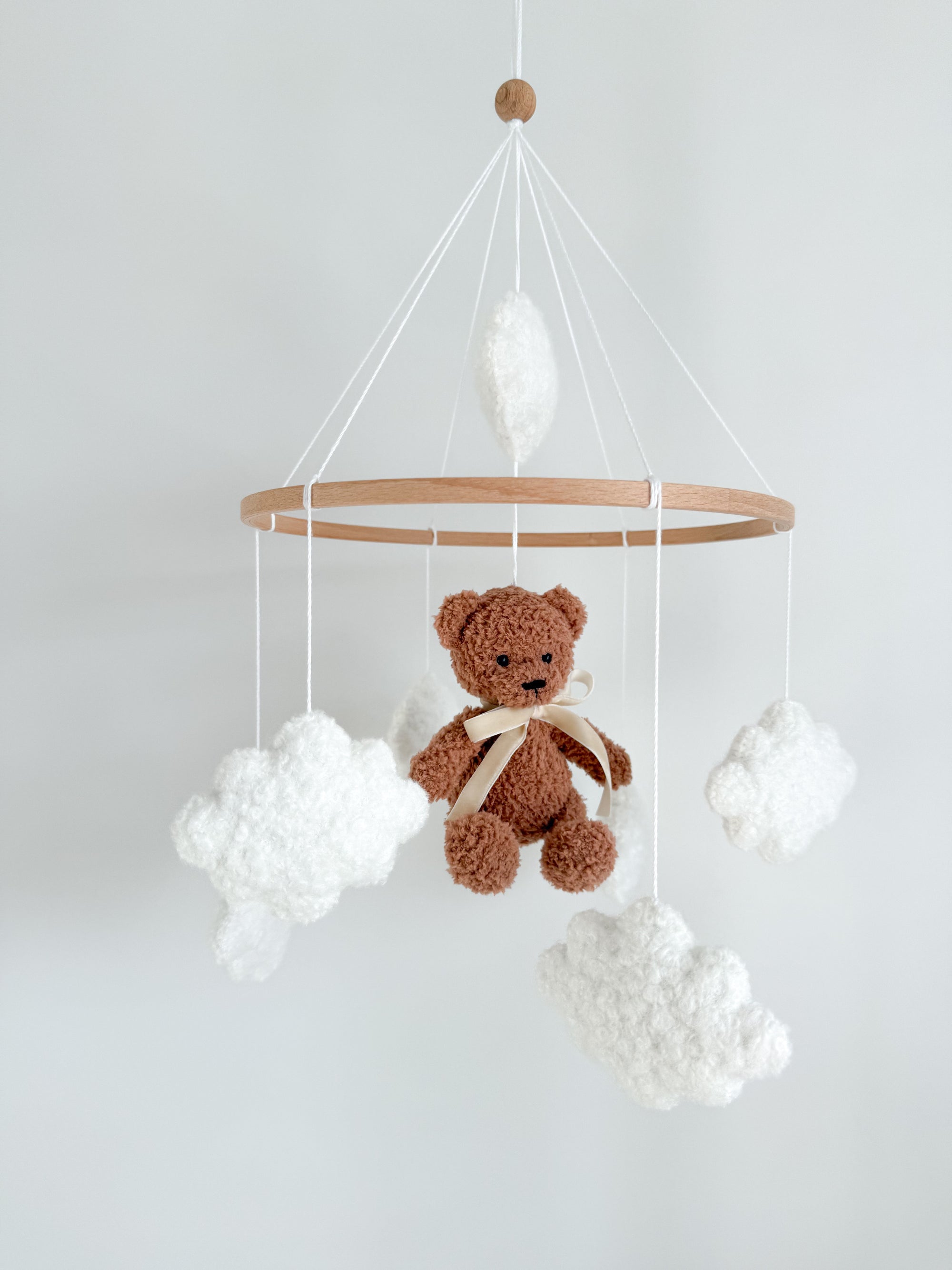 Boucle mobile with brown teddy bear