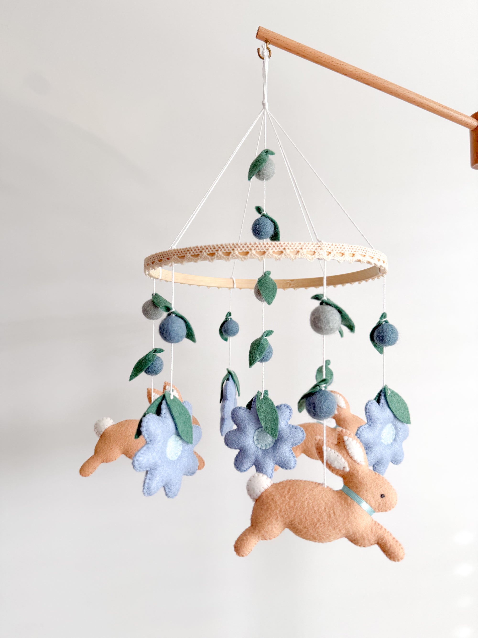 Rabbit mobile with blue flowers